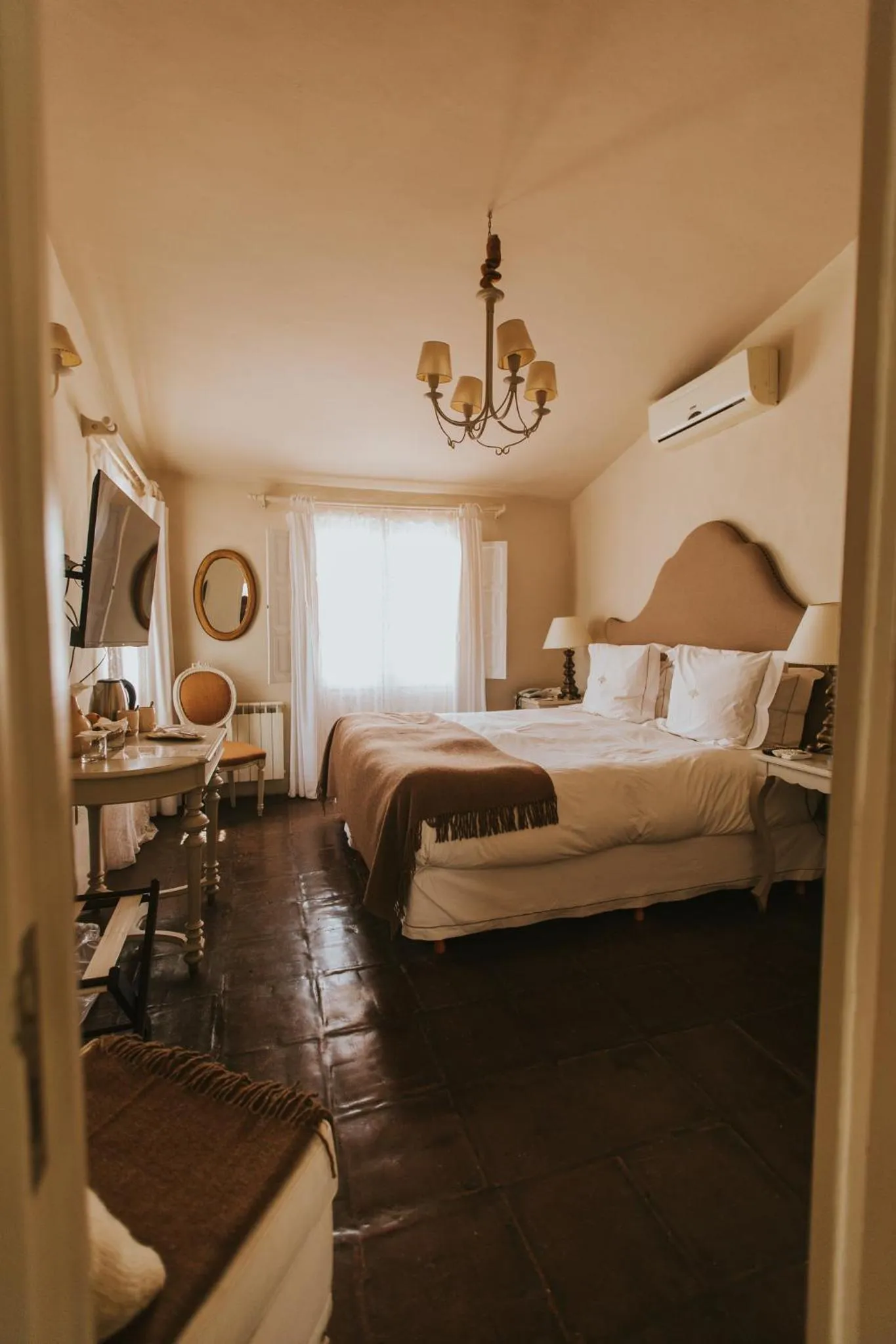 Bed in House of Jasmines Relais & Châteaux