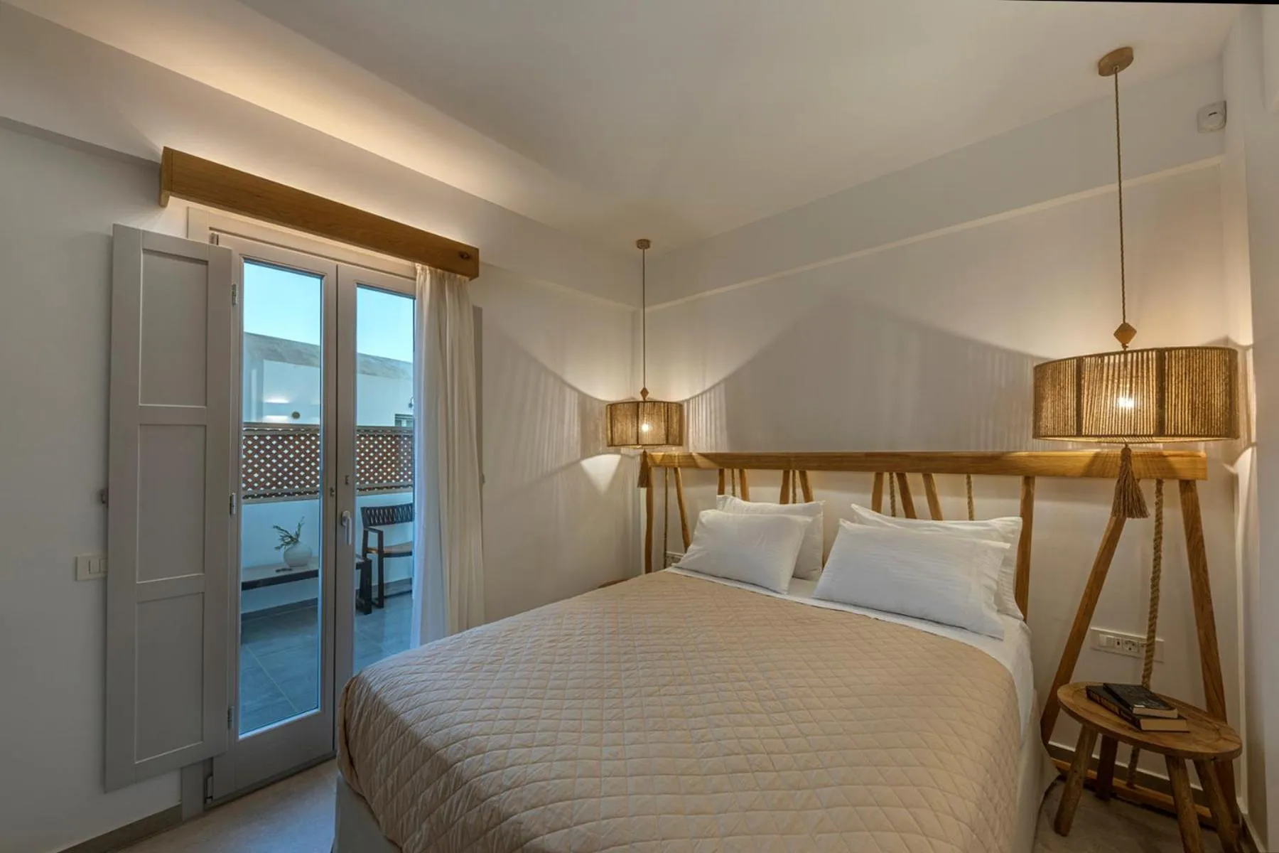 Bed in Alafropetra Luxury Suites