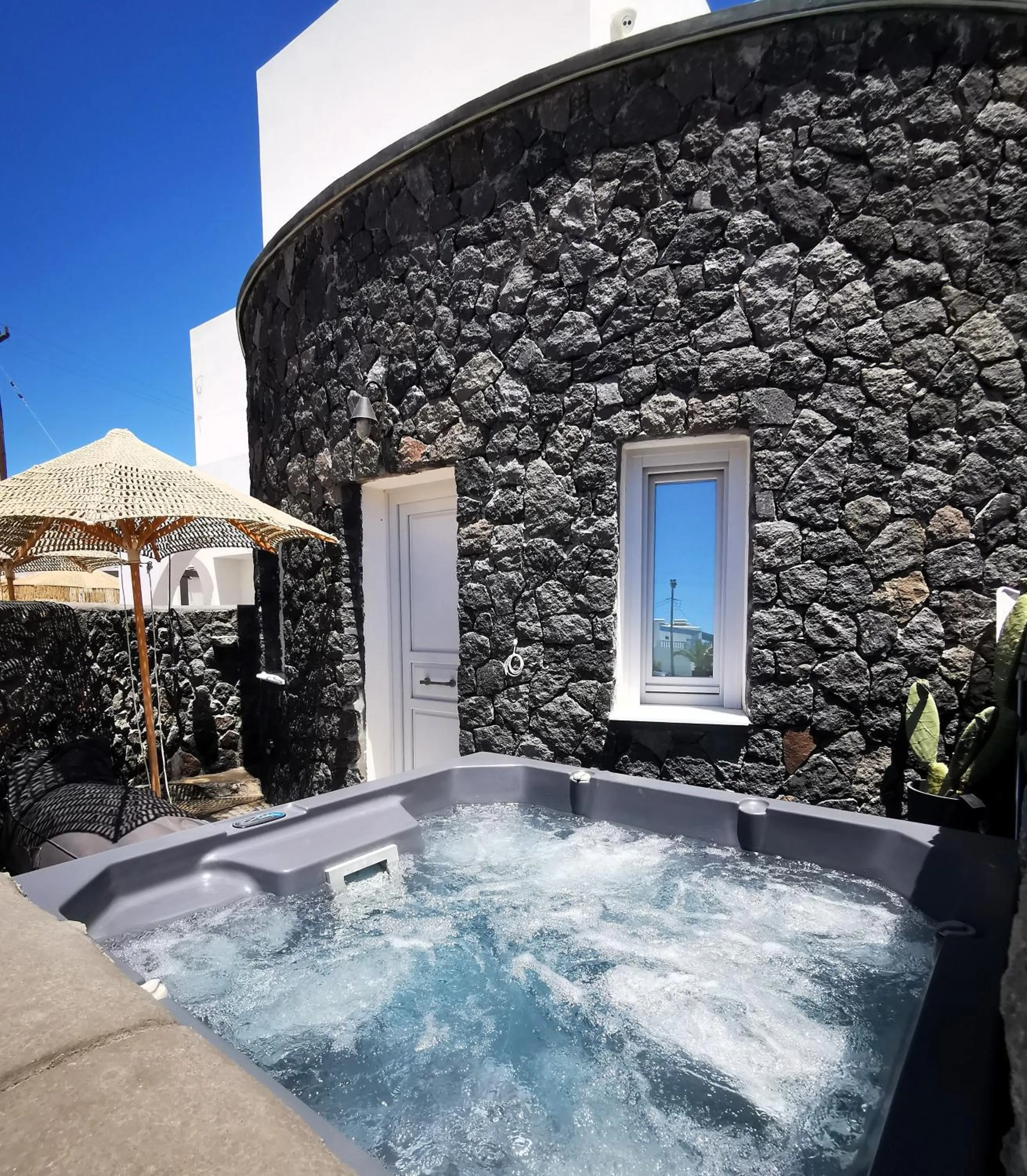 Hot Tub in Alafropetra Luxury Suites