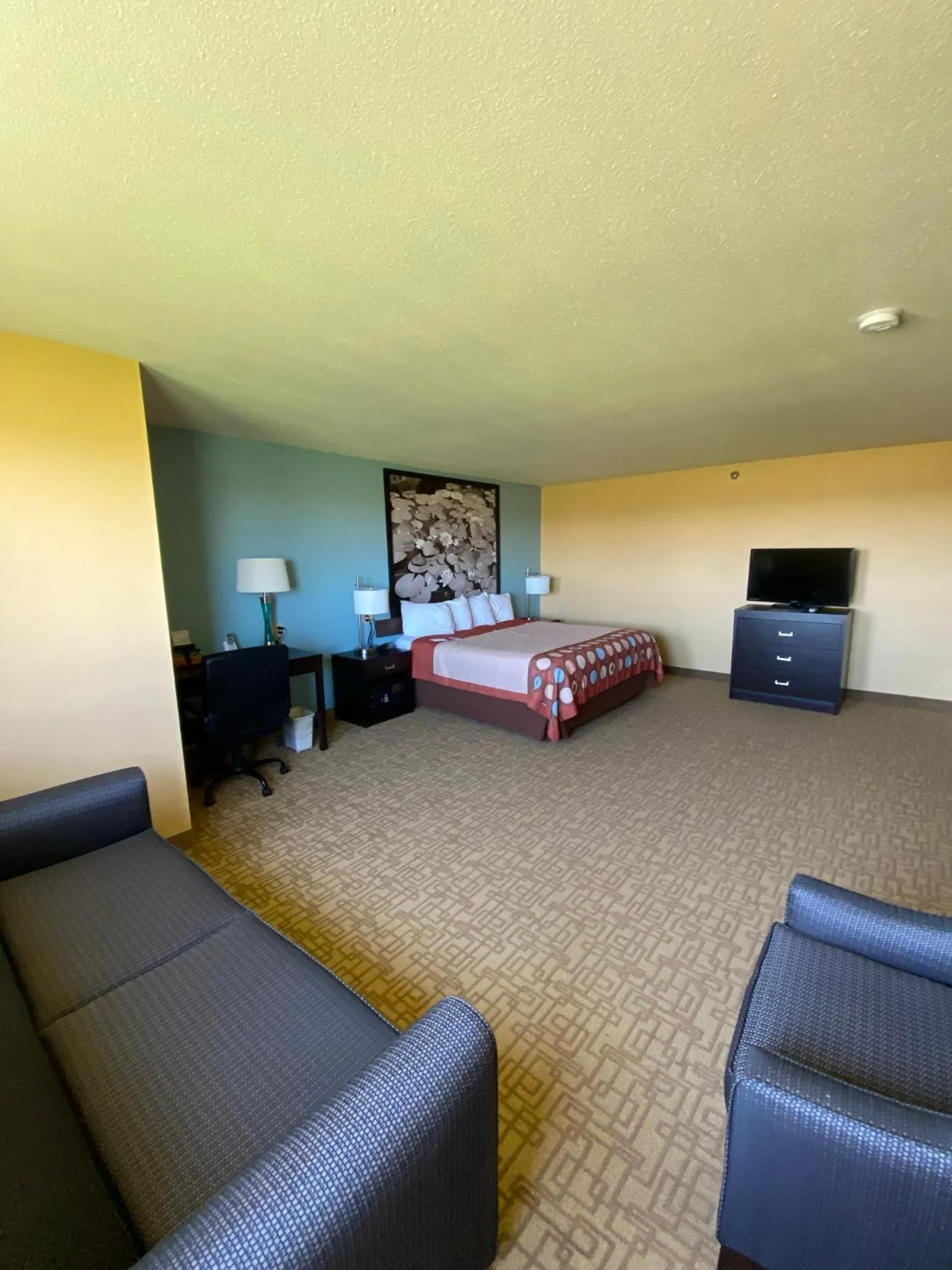 Bed in Super 8 by Wyndham Jackson MN