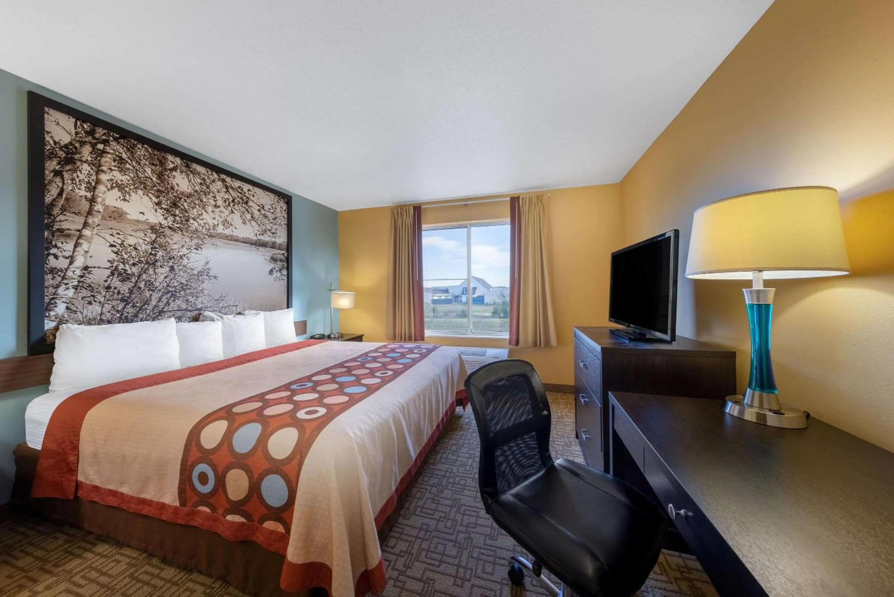 Photo of the whole room, Bed in Super 8 by Wyndham Jackson MN