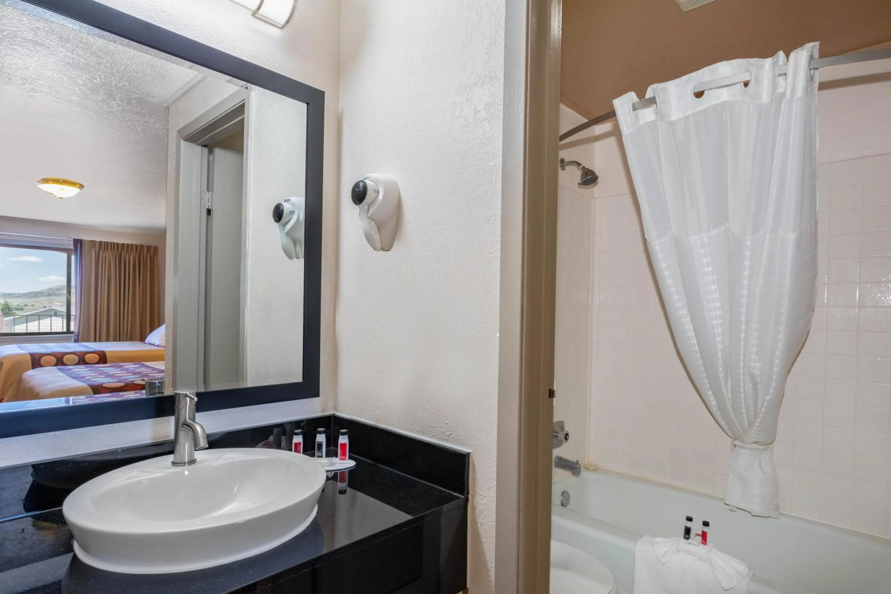 Bathroom in Super 8 by Wyndham Evanston