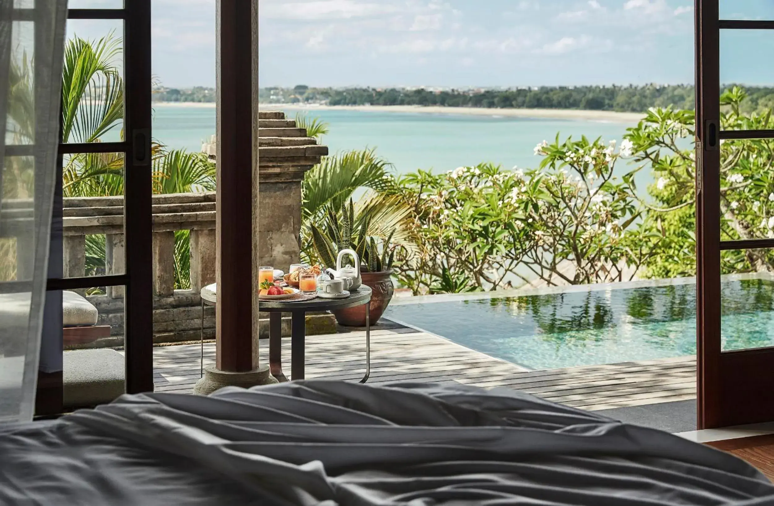 Bed in Four Seasons Resort Bali at Jimbaran Bay Bed in Four Seasons Resort Bali at Jimbaran Bay