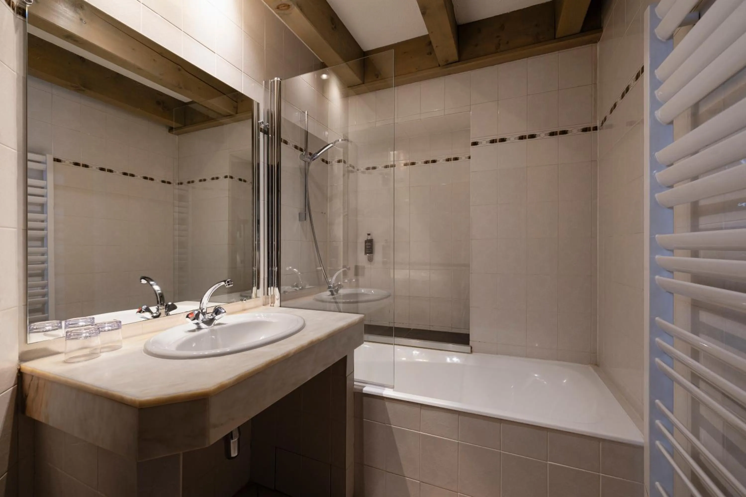 Bathroom in Hôtel de L'Arve by HappyCulture