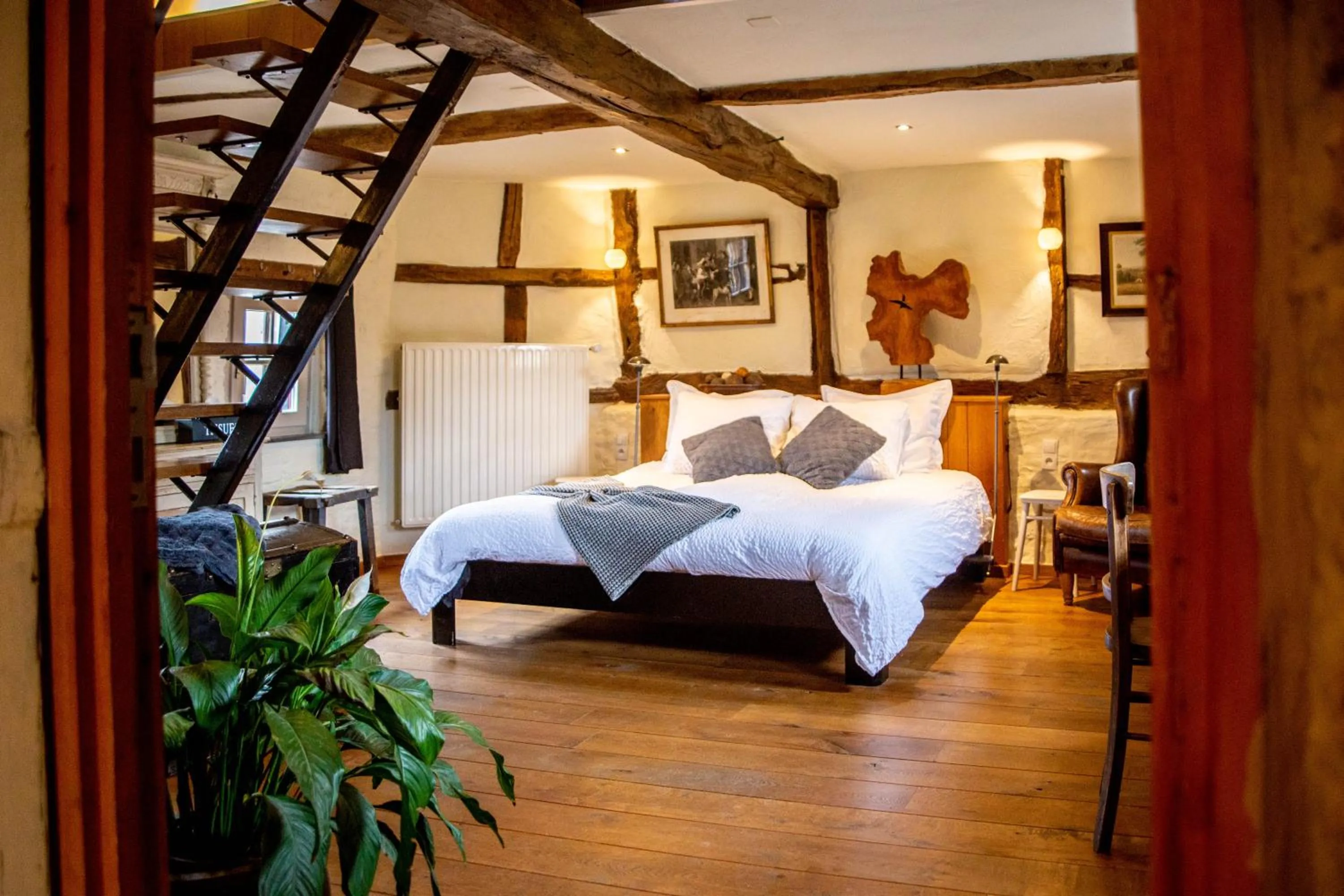 Bed in Een vleugje wellness in de Voerstreek - Bed & Brocante Onder de Poort