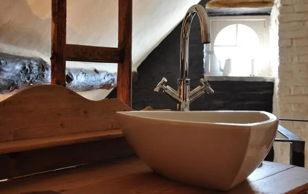 Property building in Een vleugje wellness in de Voerstreek - Bed & Brocante Onder de Poort