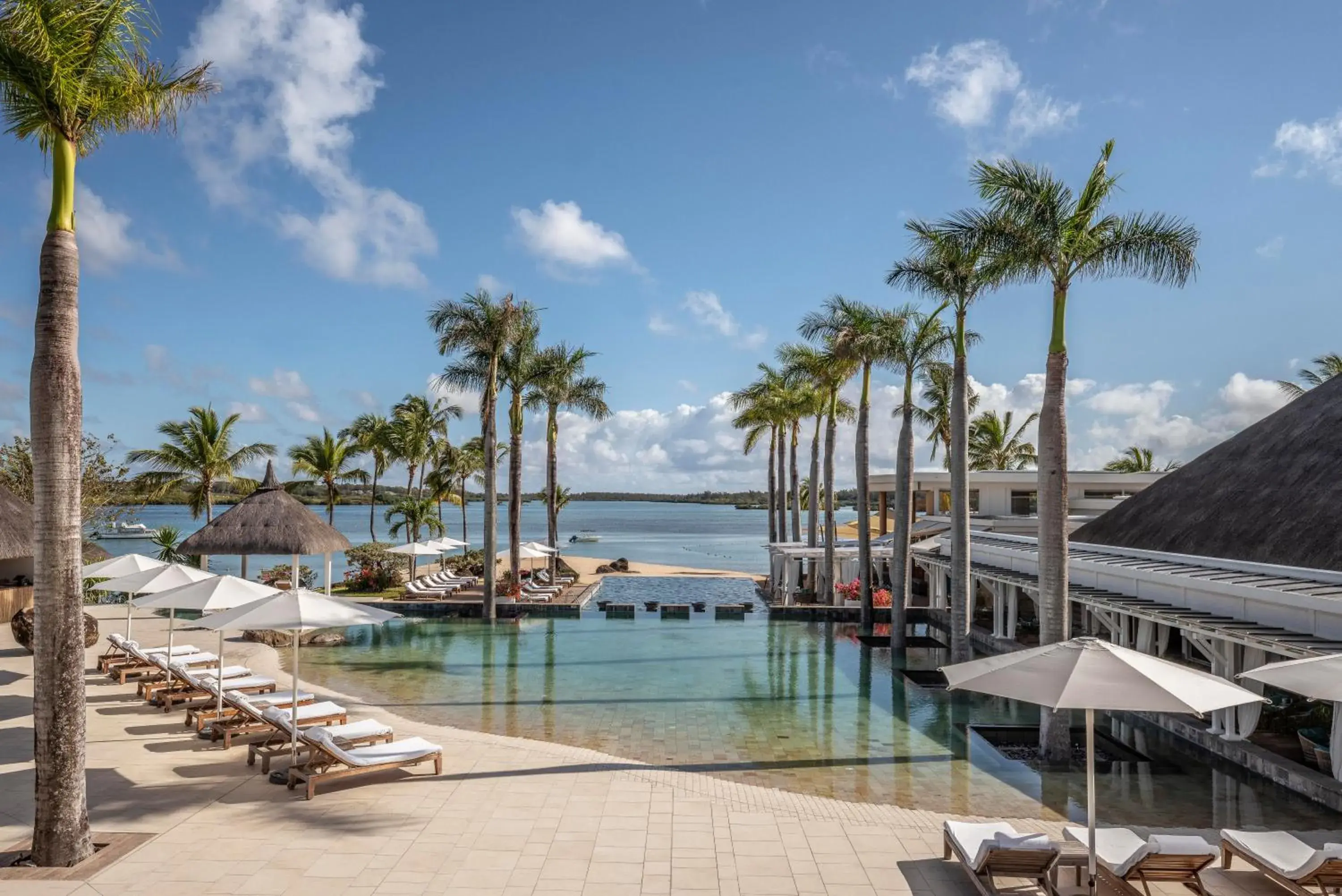 Pool view in Four Seasons Resort Mauritius at Anahita Pool view in Four Seasons Resort Mauritius at Anahita