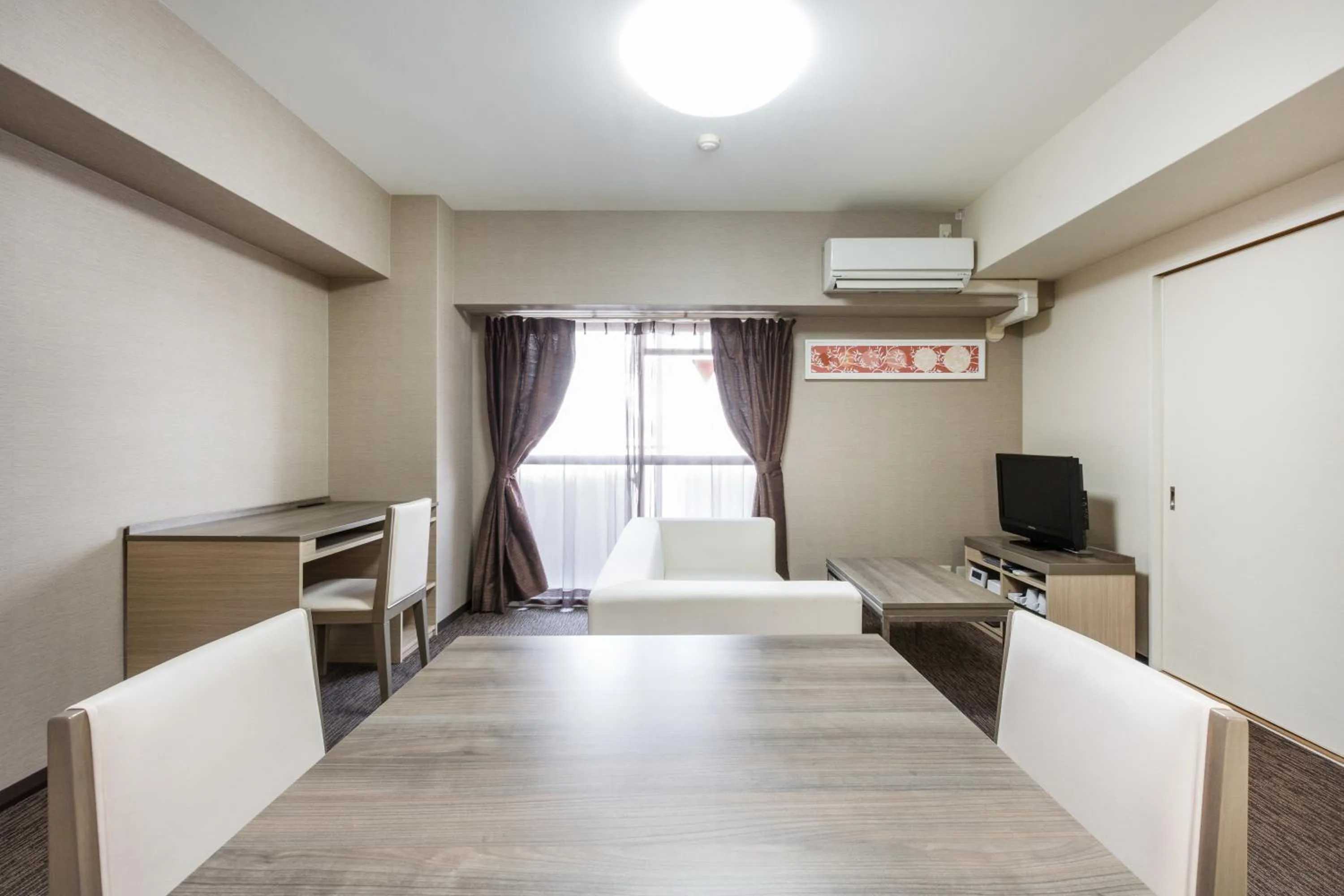 Living room, Bed in HOTEL MYSTAYS Otemae