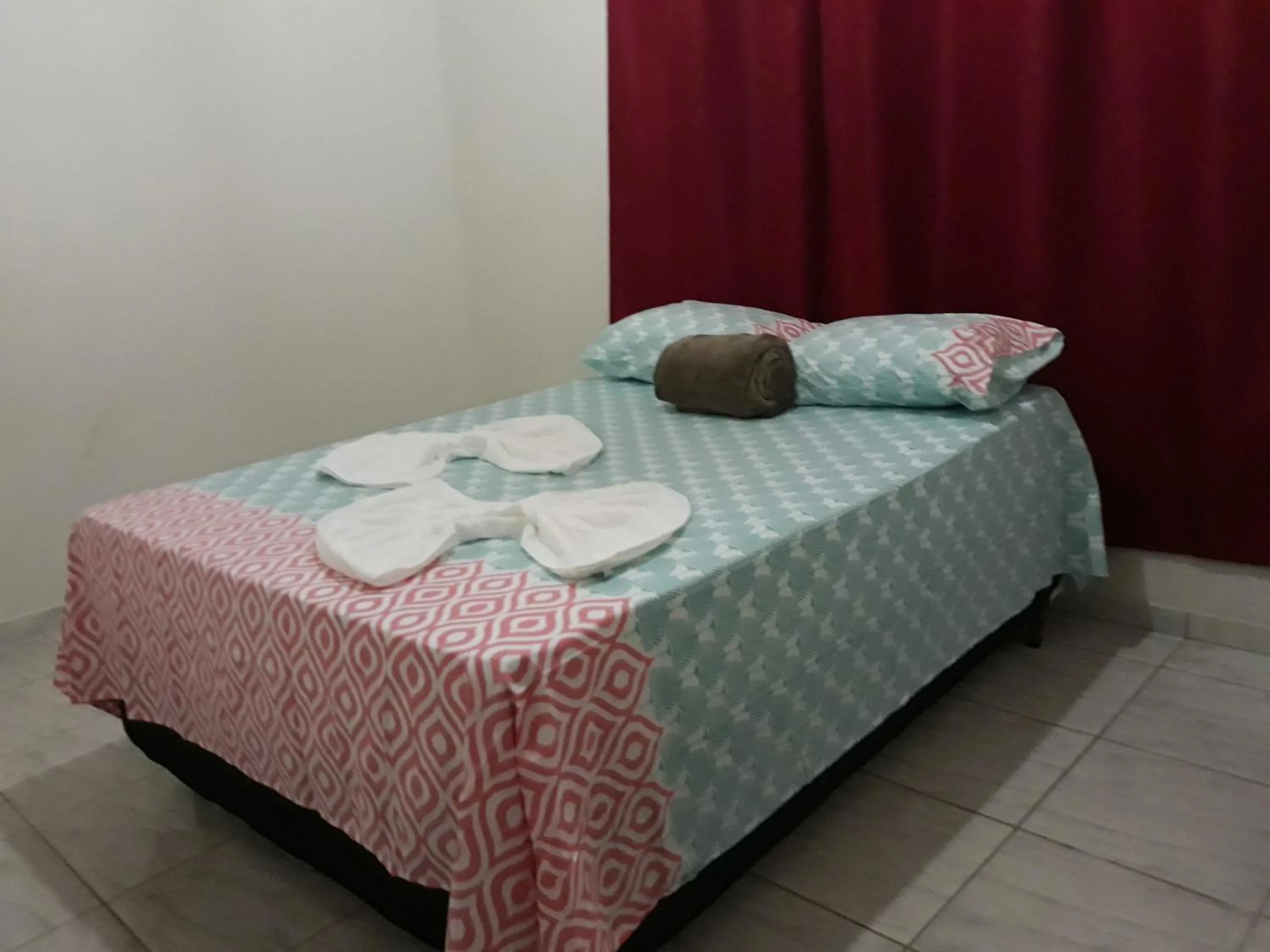 Bed in Pousada da Ana