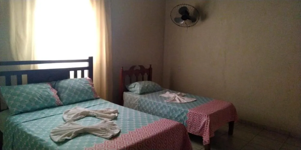 Bed in Pousada da Ana