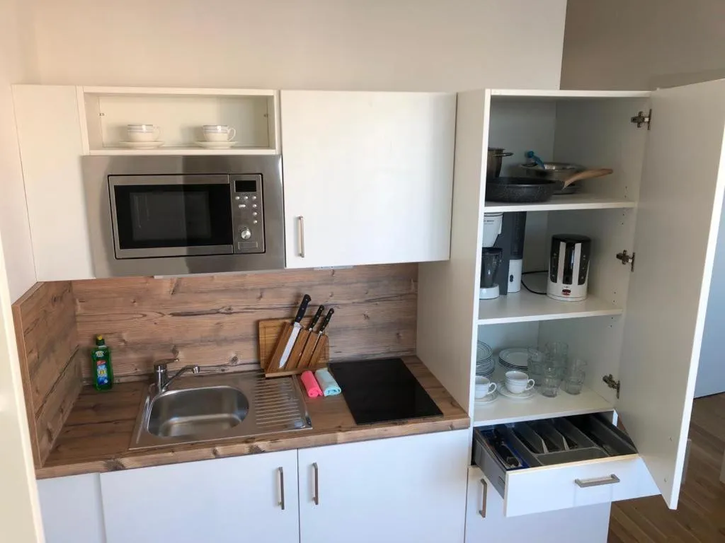Kitchen or kitchenette in My room serviced apartment-Messe