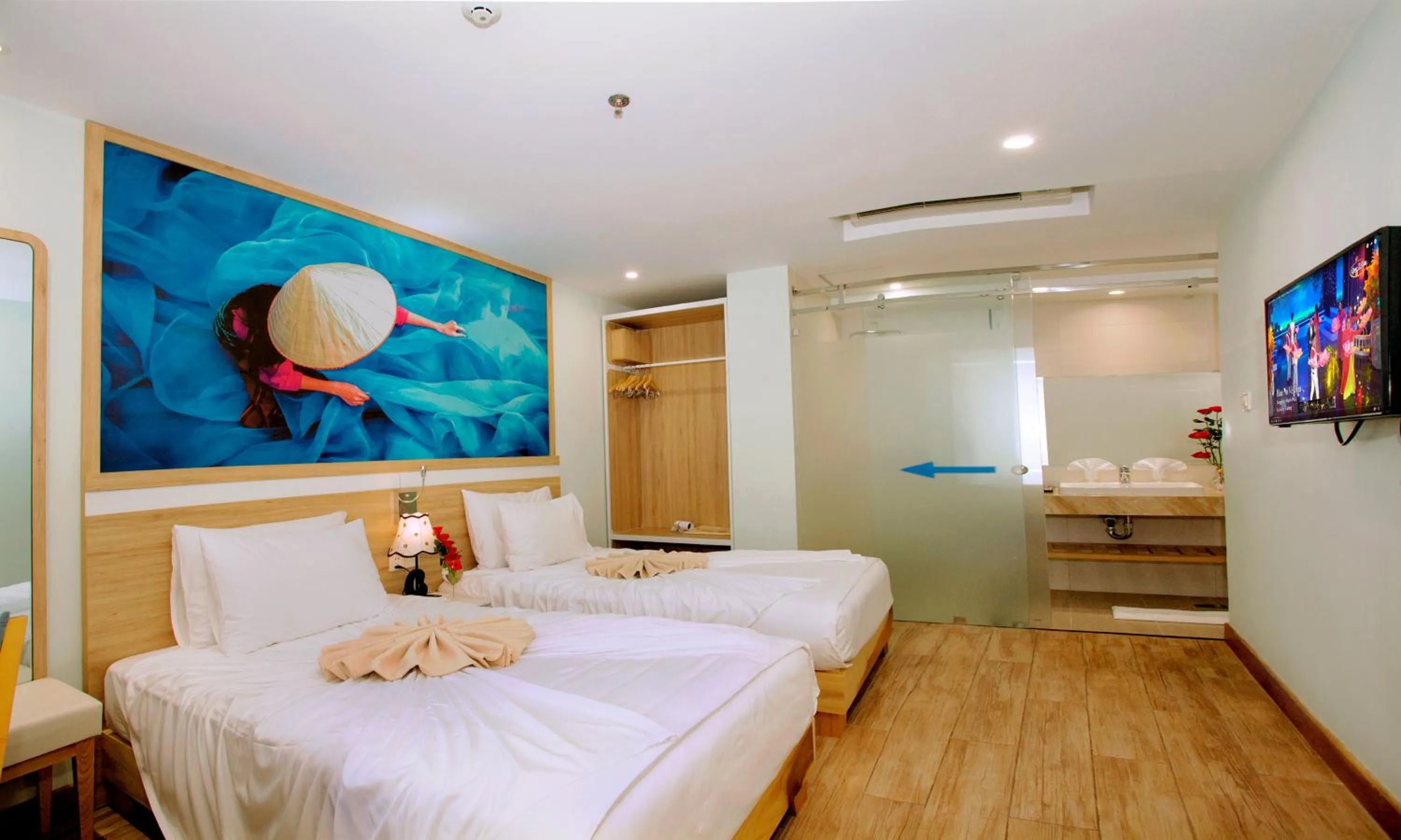 Bed in Royal HPM Hotel