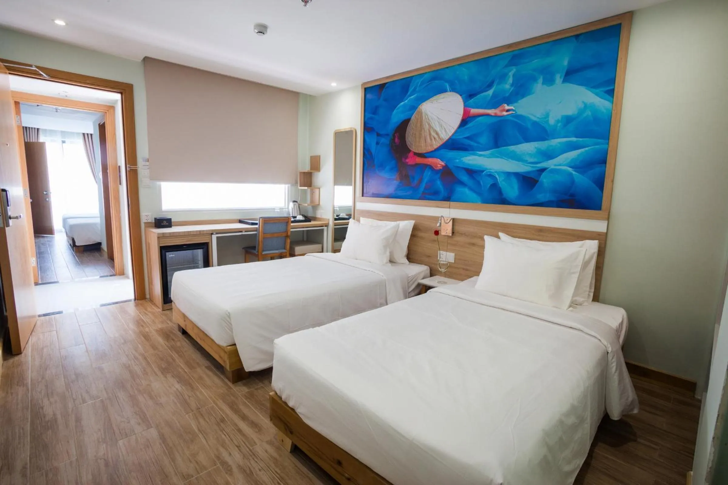 Bed in Royal HPM Hotel