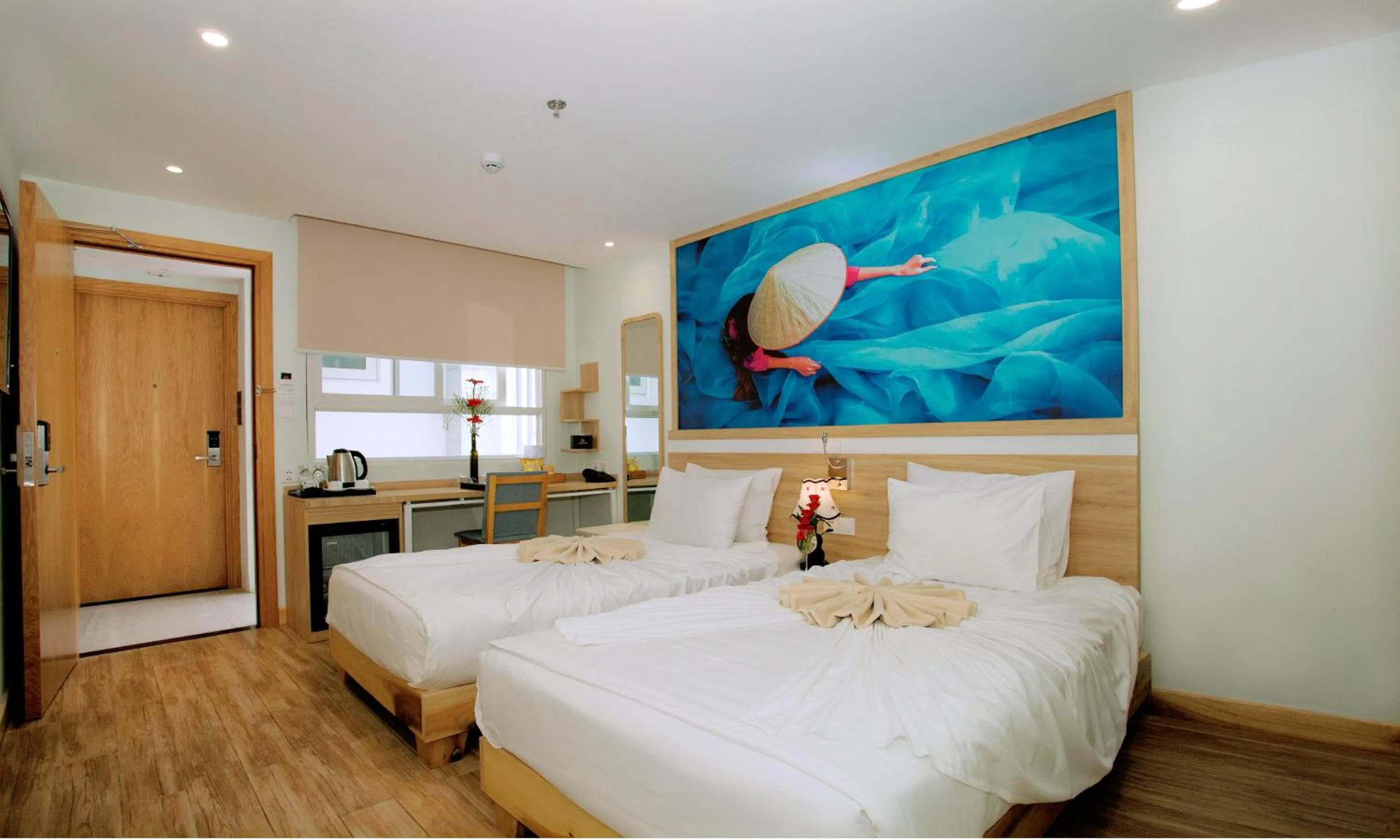 Bed in Royal HPM Hotel