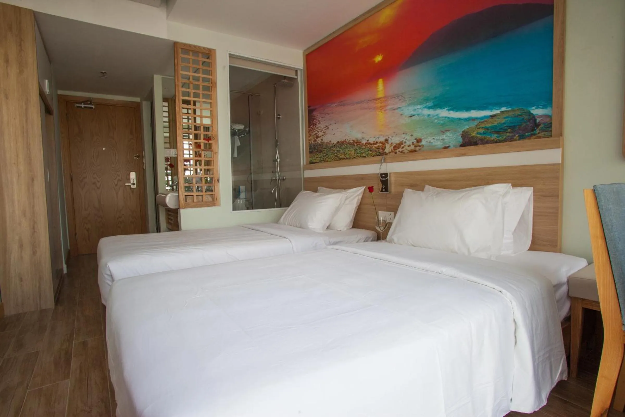 Bed in Royal HPM Hotel