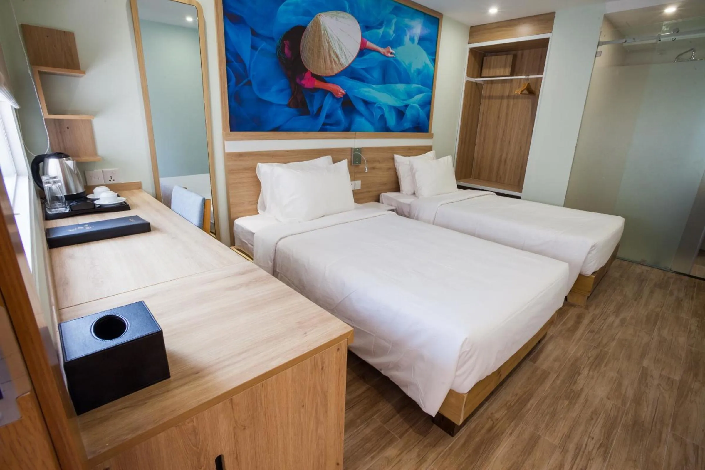 Bed in Royal HPM Hotel