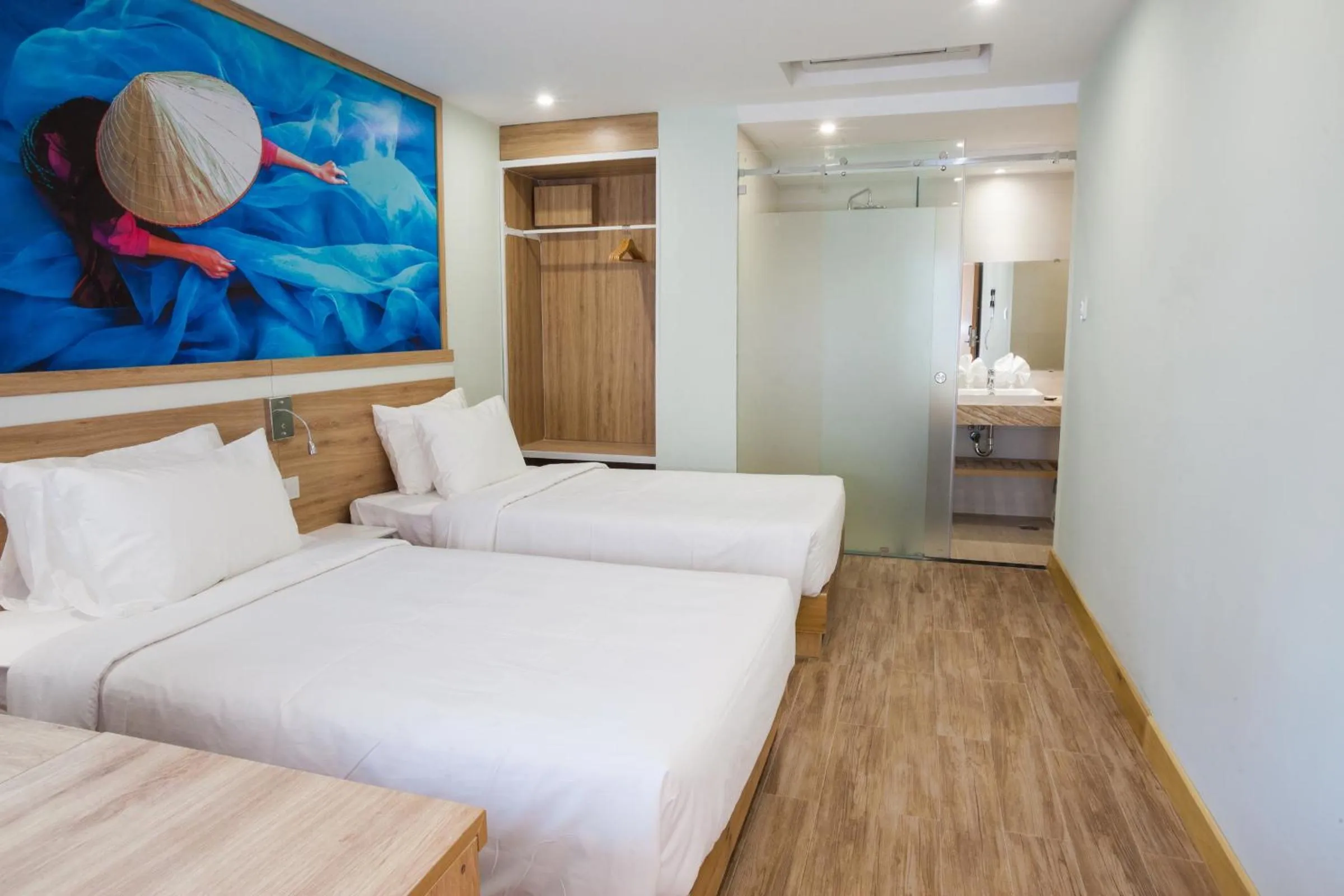 Bed in Royal HPM Hotel