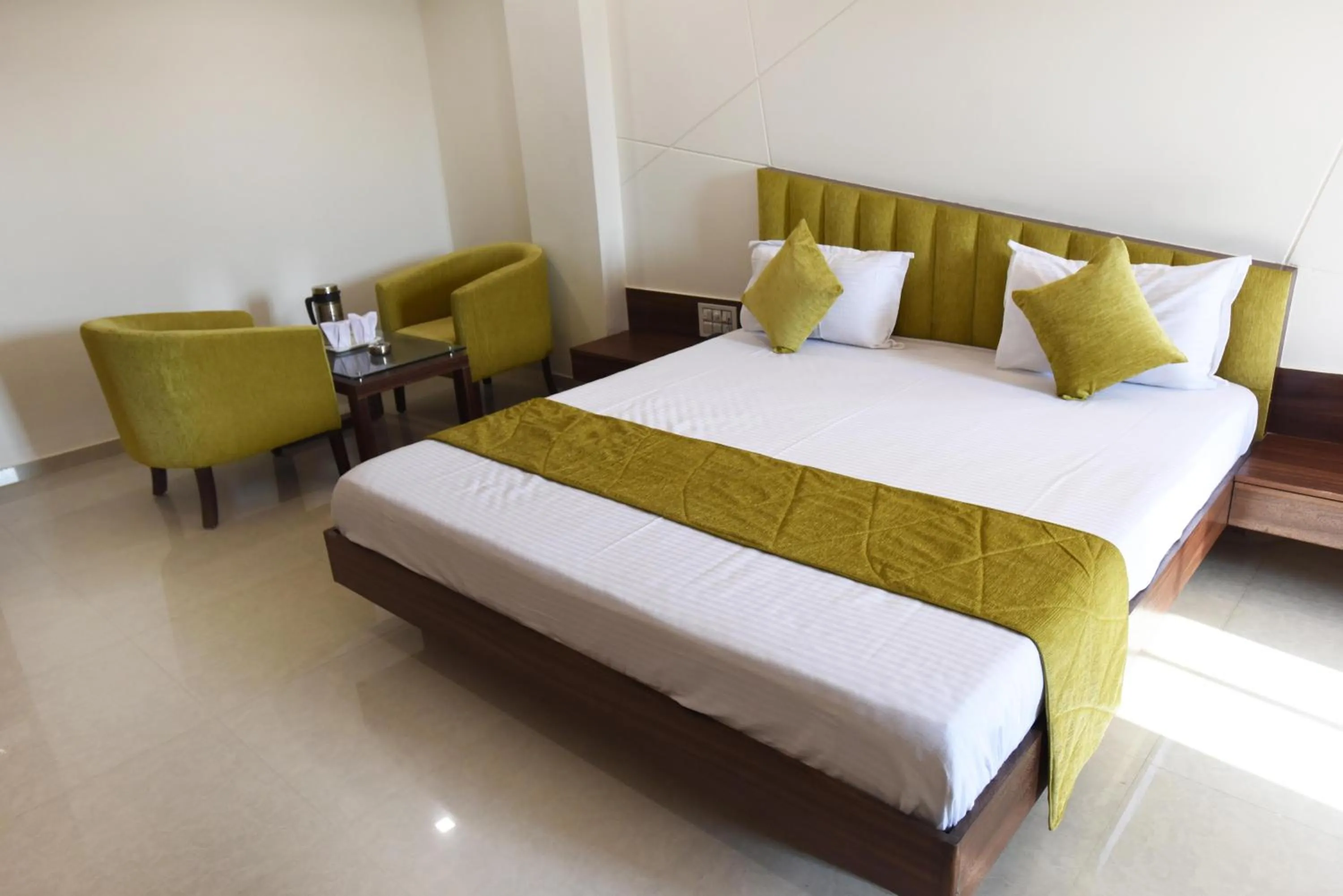 Bed in Hotel Luxura, Ahmedabad