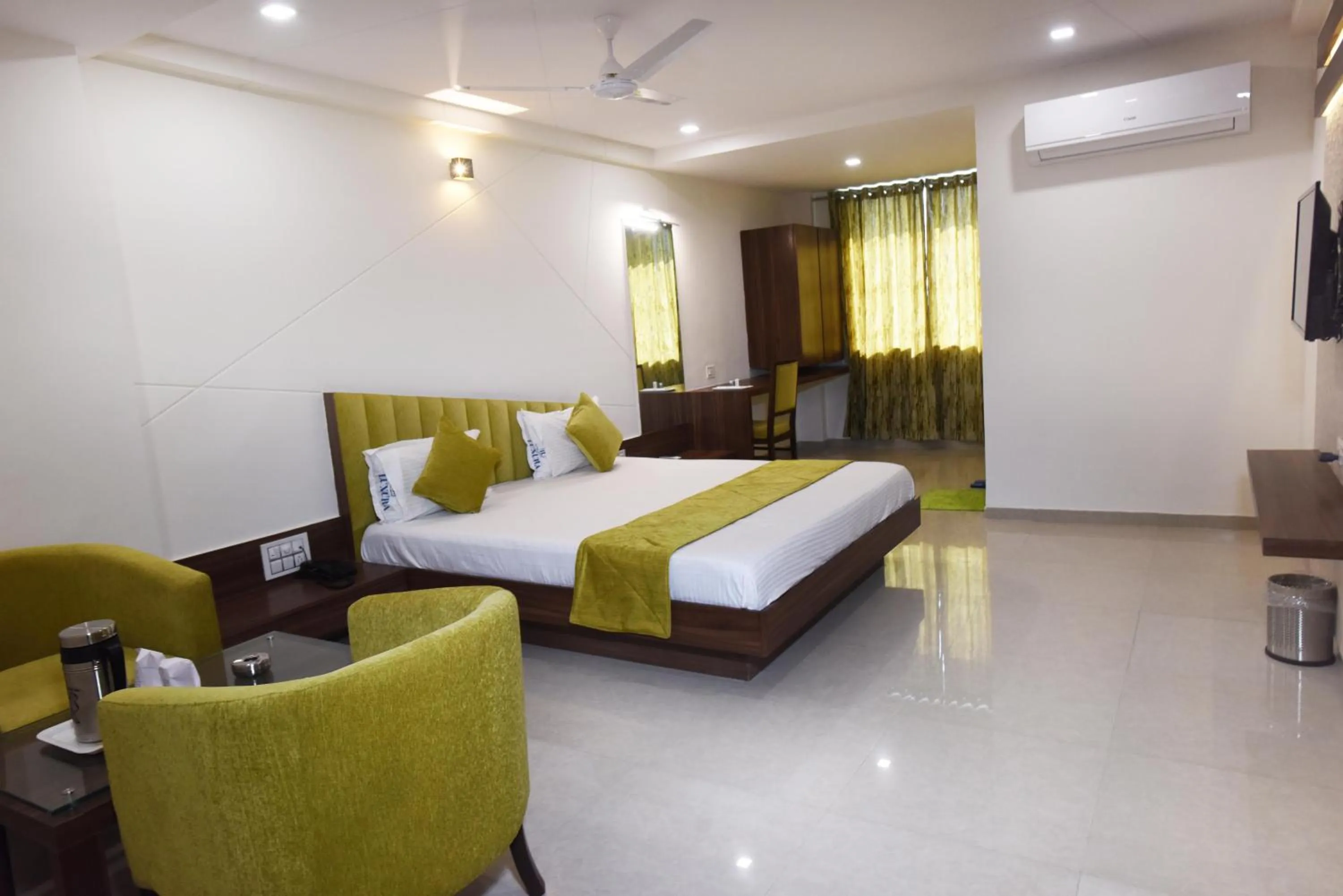 Photo of the whole room, Bed in Hotel Luxura, Ahmedabad