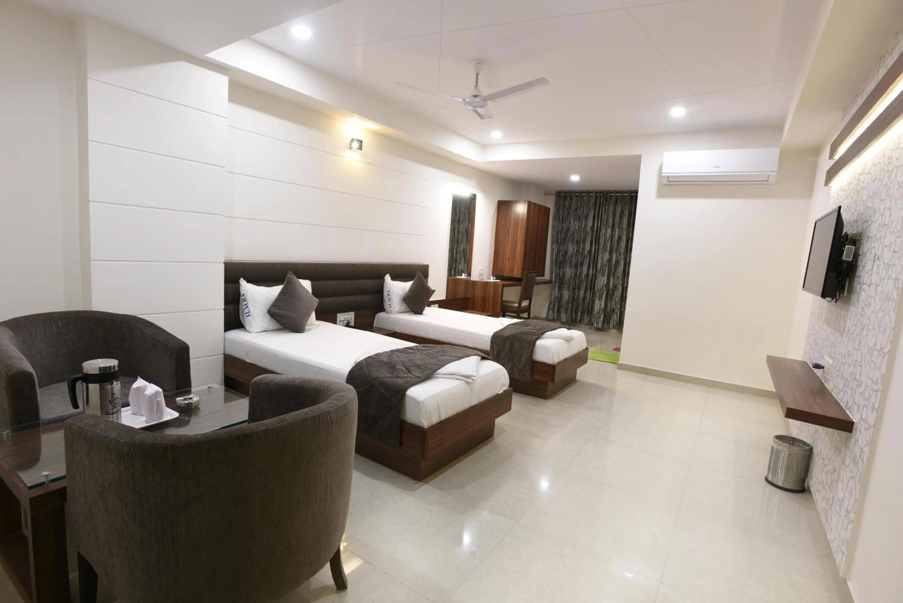 Photo of the whole room, Bed in Hotel Luxura, Ahmedabad