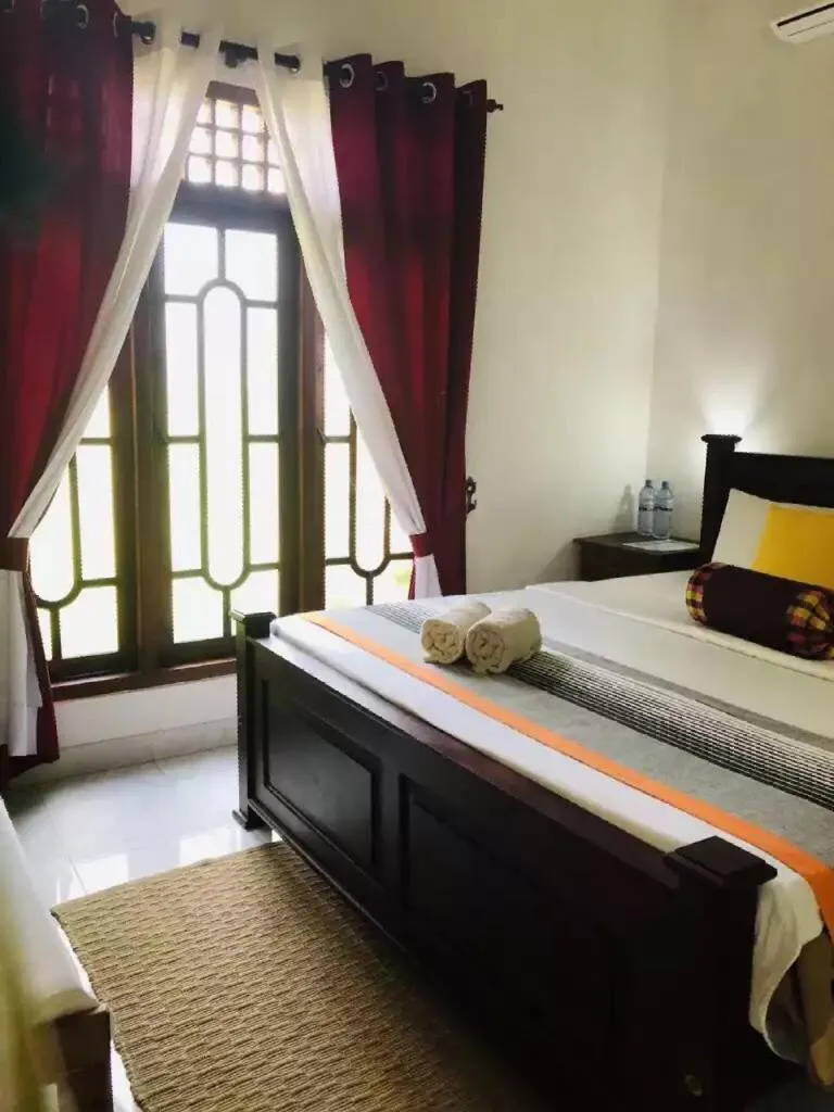 Bed in Bangalawa Resort