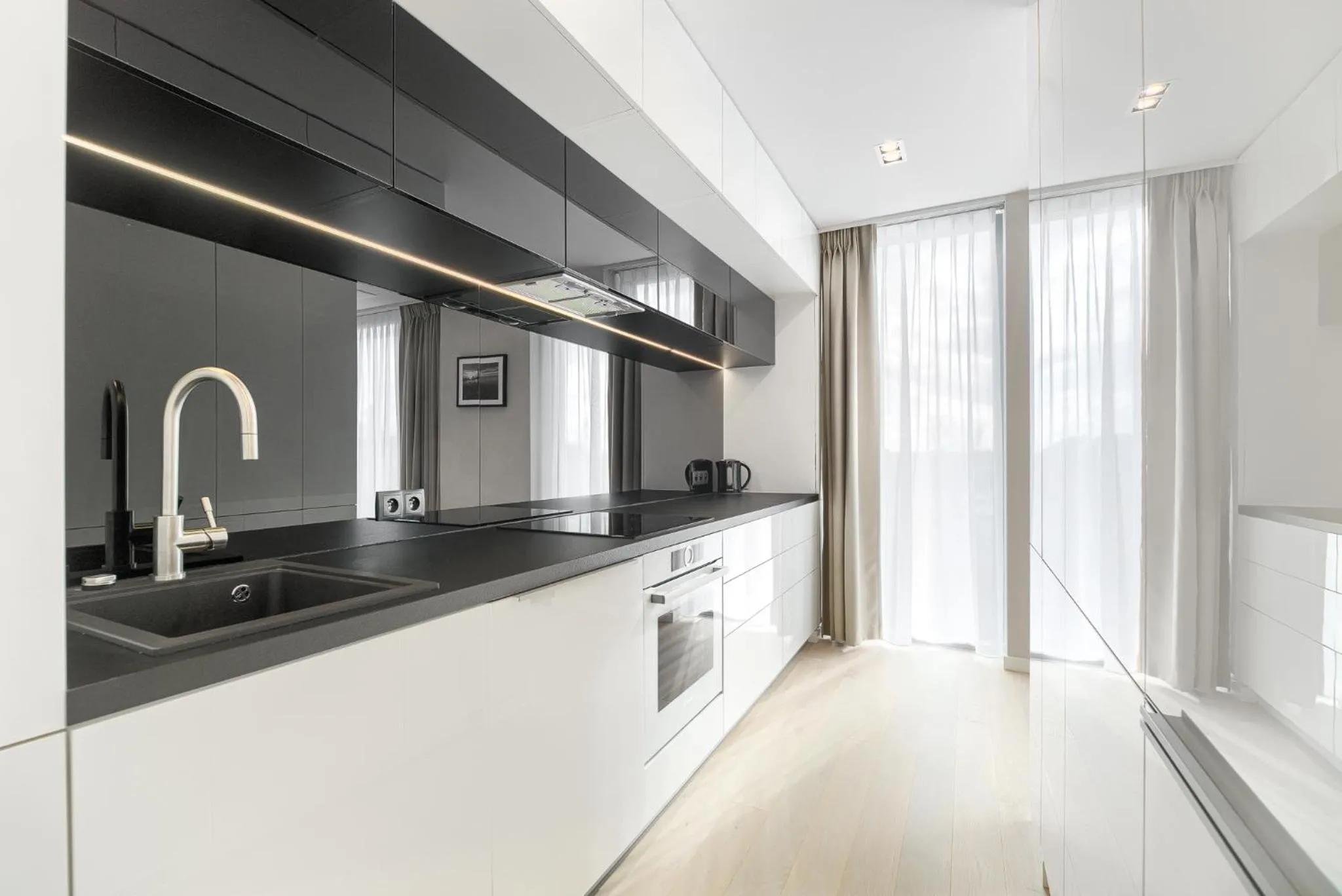 Kitchen or kitchenette in Dune Resort Mielno - C