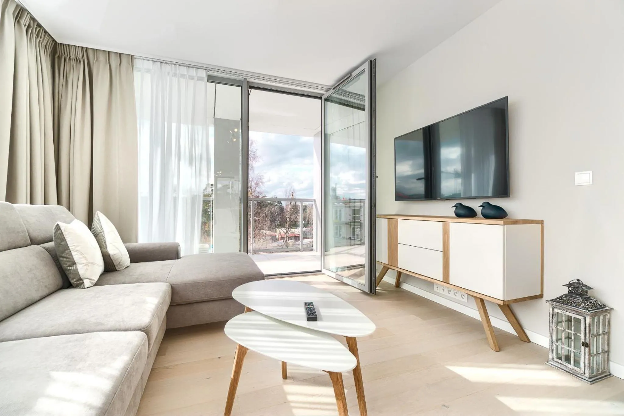 Communal lounge/ TV room in Dune Resort Mielno - C