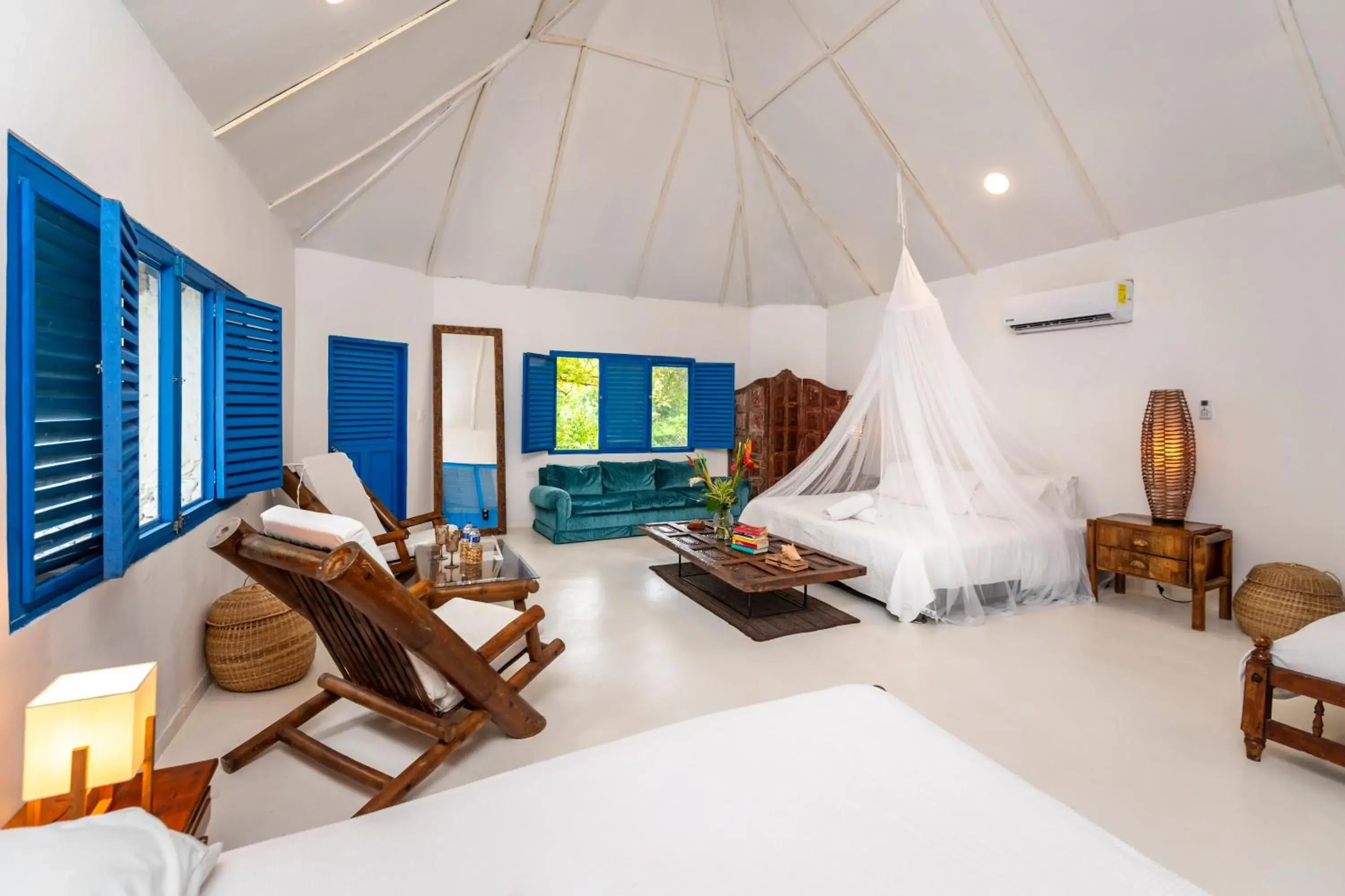 Premium Quadruple Room with Garden View in Hotel Coralina Island Premium Quadruple Room with Garden View in Hotel Coralina Island