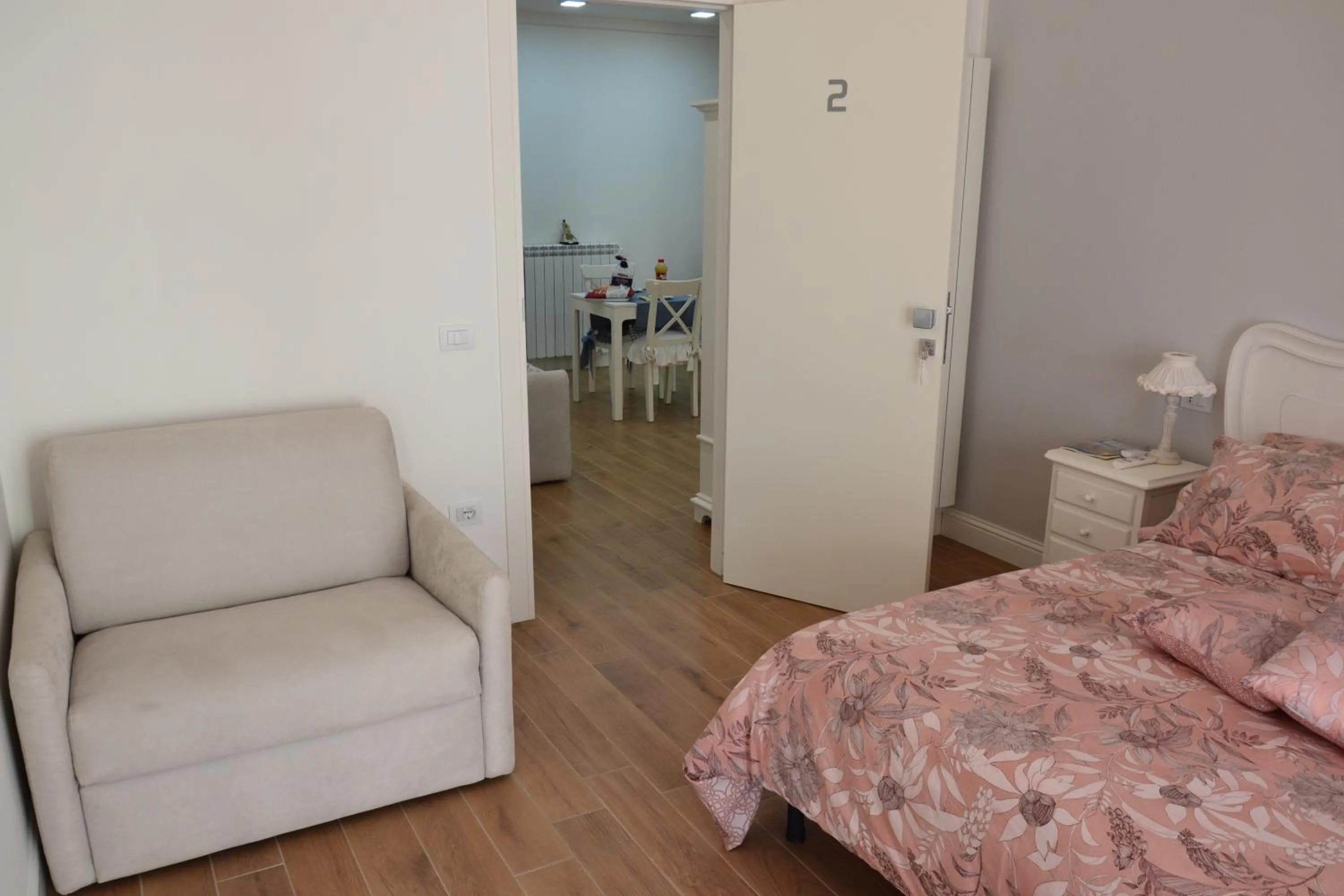 Living room, Bed in B&B Coffee and City Pompei