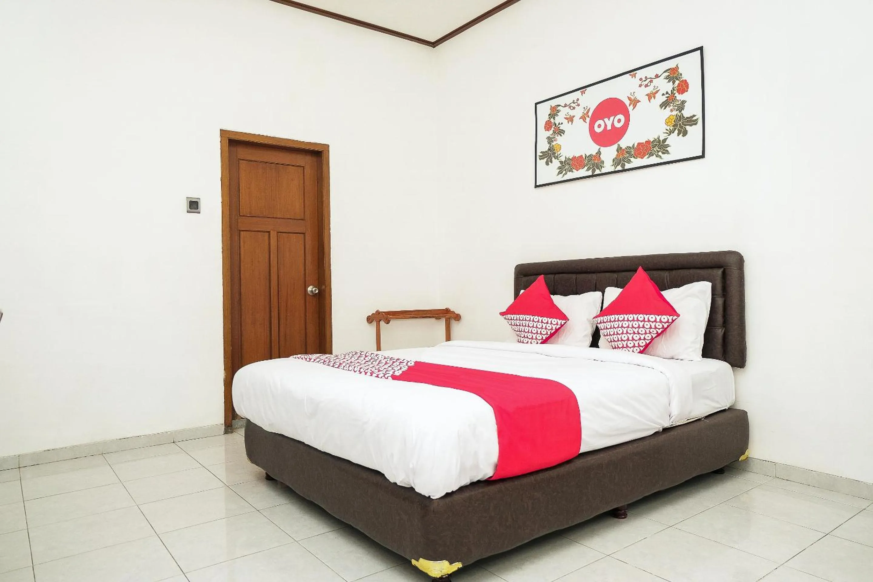 Bedroom in Hotel O Loesje Guest House Syariah
