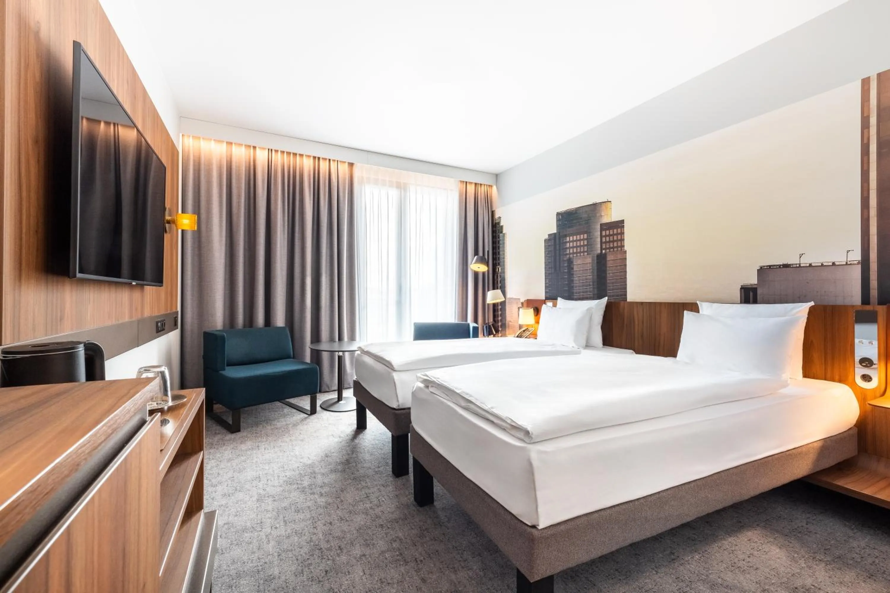 Photo of the whole room, Bed in Novotel Regensburg Zentrum