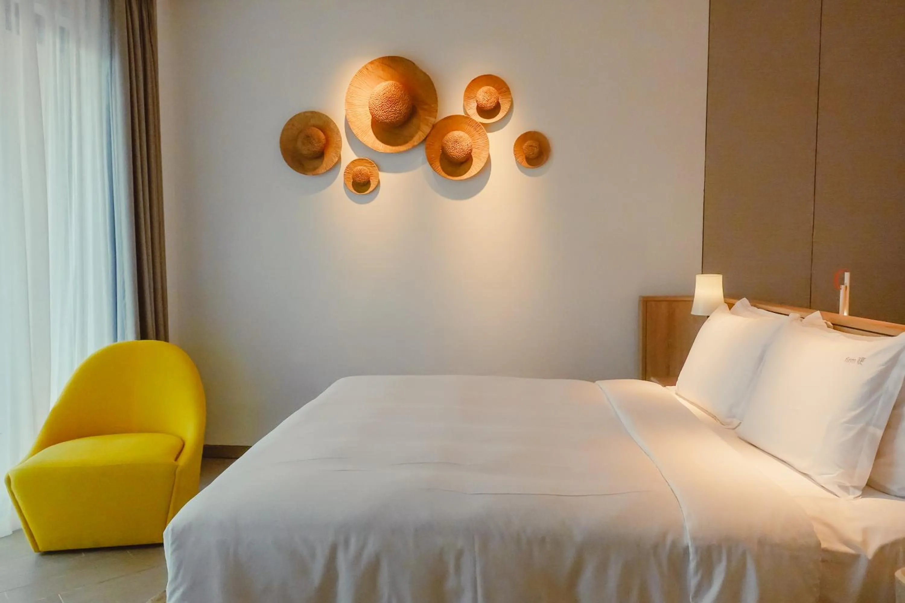 Bed in Holiday Inn Resort Qionghai Guantang by IHG