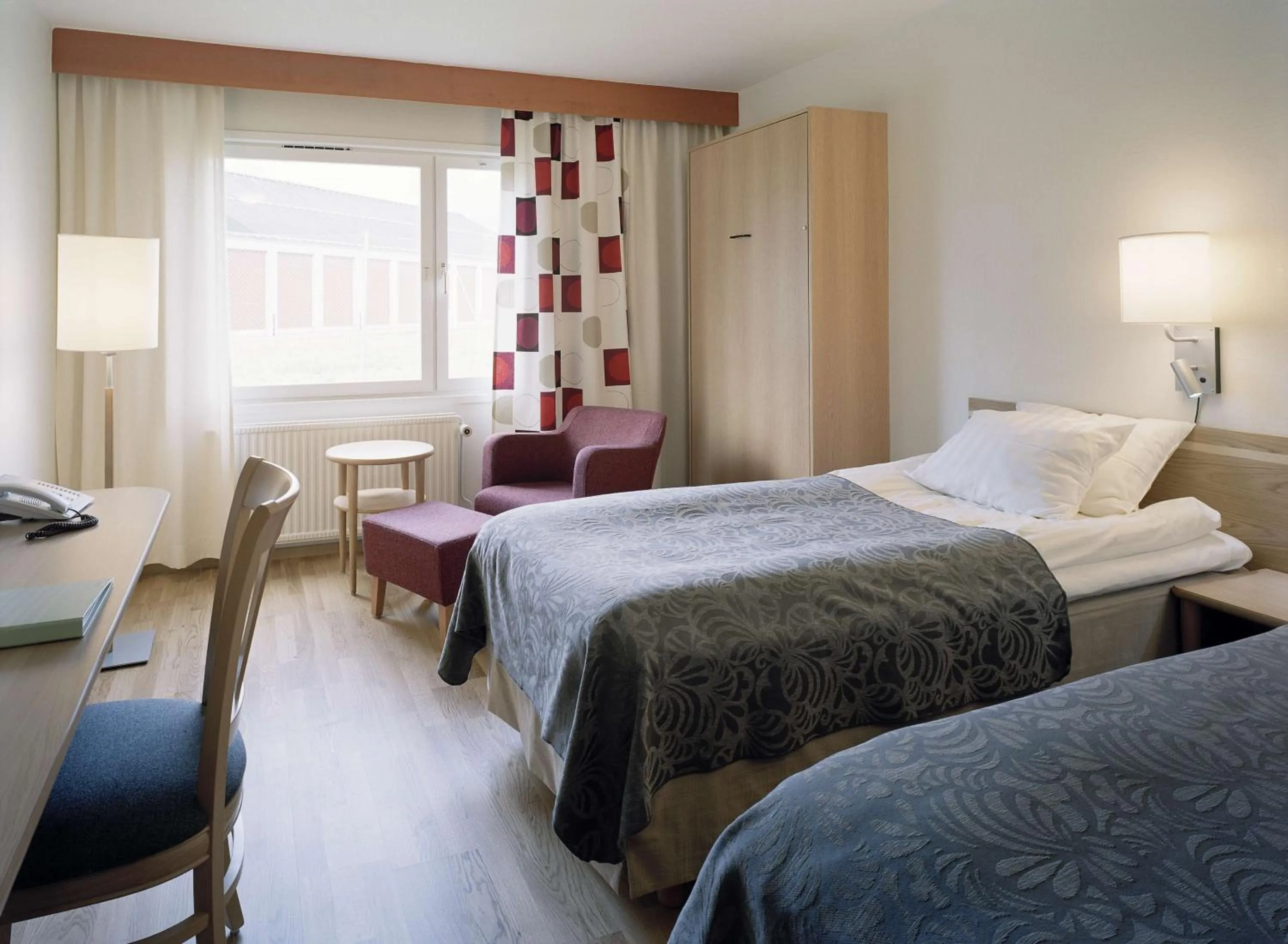 Photo of the whole room, Bed in Scandic Uppsala Nord