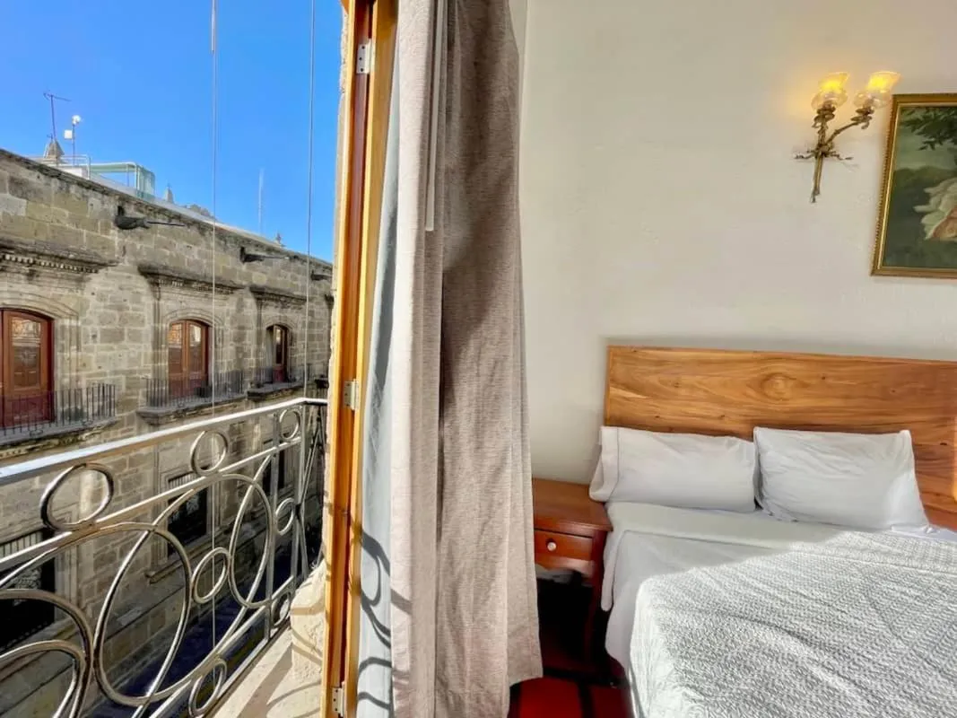 Balcony/Terrace, Bed in Hotel Frances