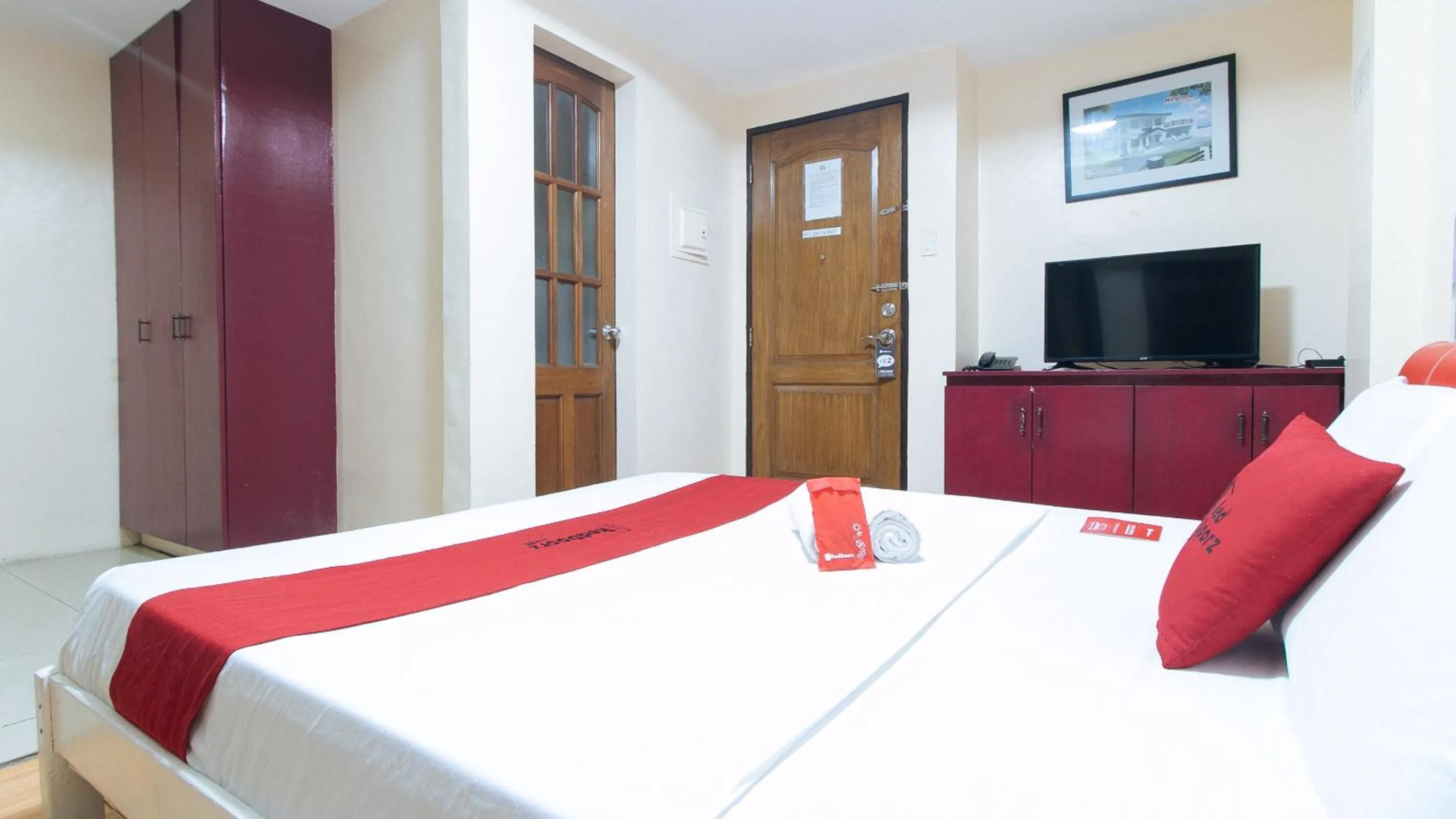 Bed in RedDoorz at DBuilders Rooms Ph2 Taguig