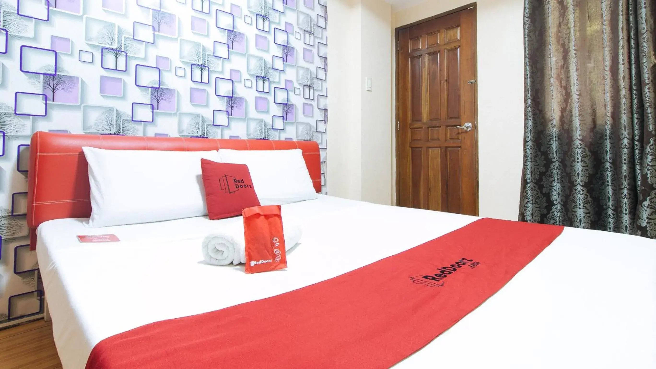 Bed in RedDoorz at DBuilders Rooms Ph2 Taguig Bed in RedDoorz at DBuilders Rooms Ph2 Taguig