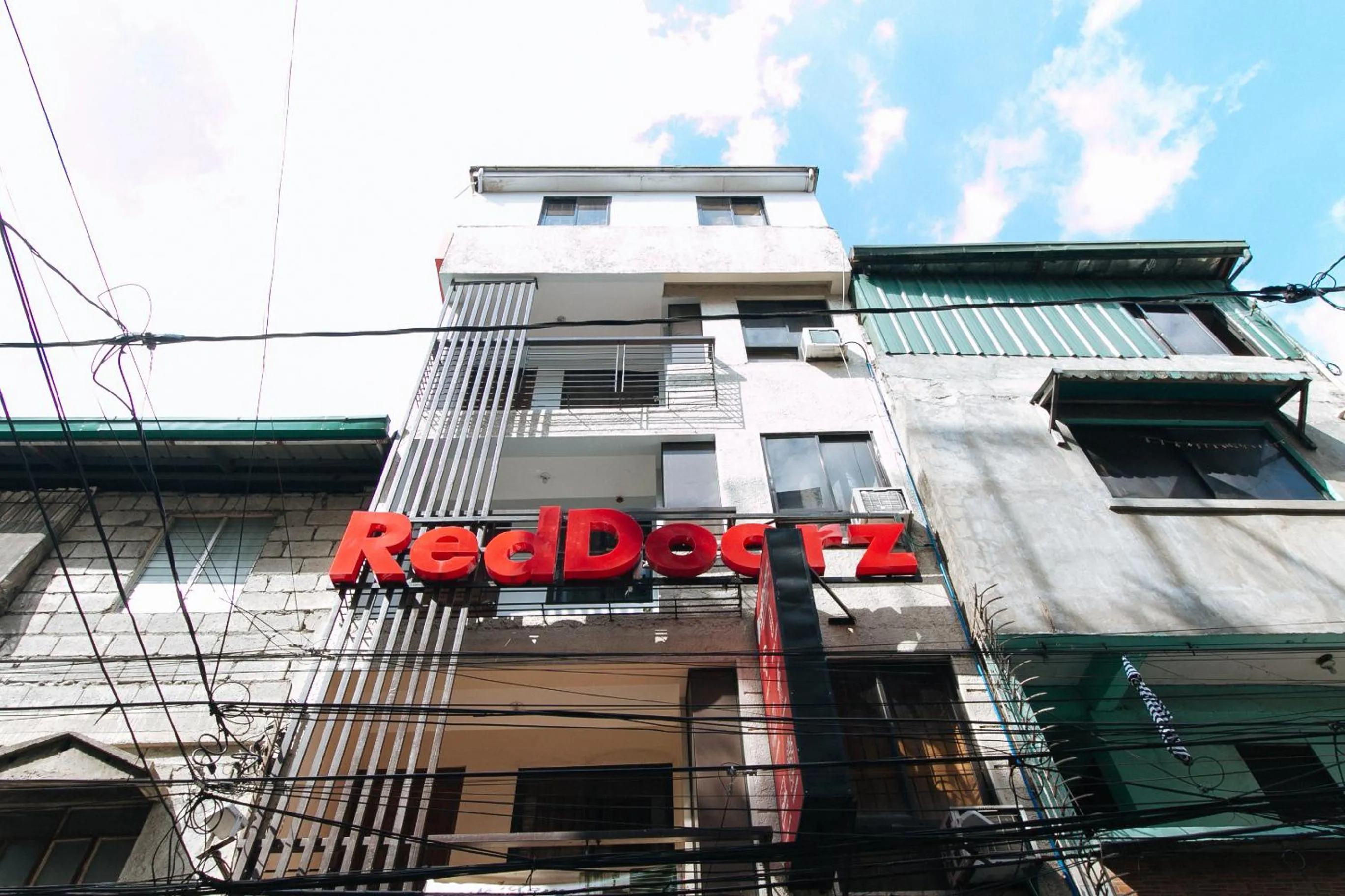 Property building in RedDoorz at DBuilders Rooms Ph2 Taguig