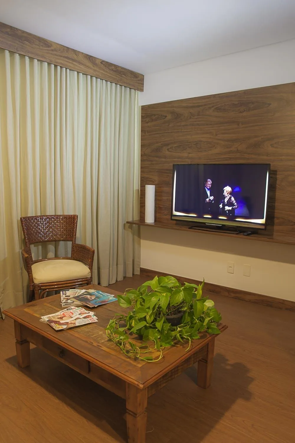 Communal lounge/ TV room in Hotel Flat Itaipava
