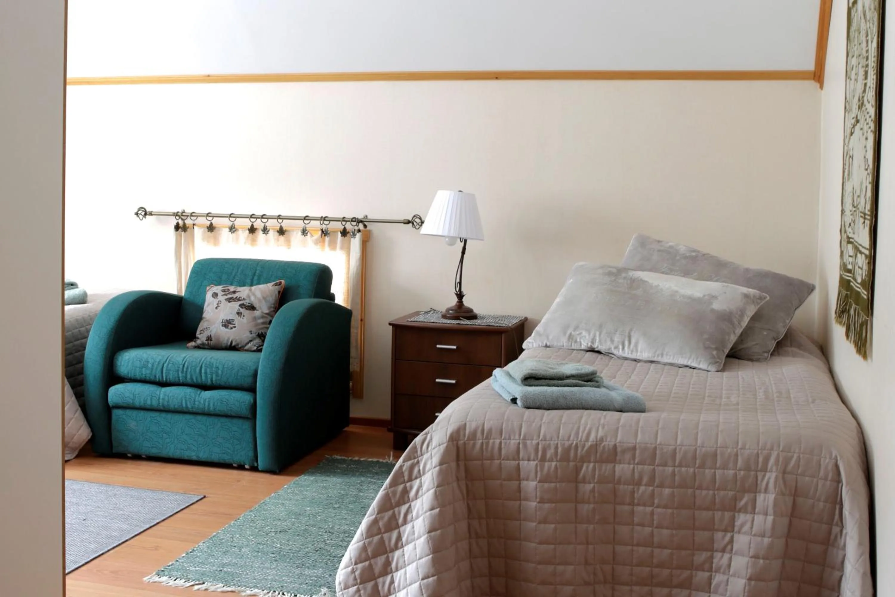 Photo of the whole room, Bed in Yli-Kaitala Holiday Resort Tuuliviiri