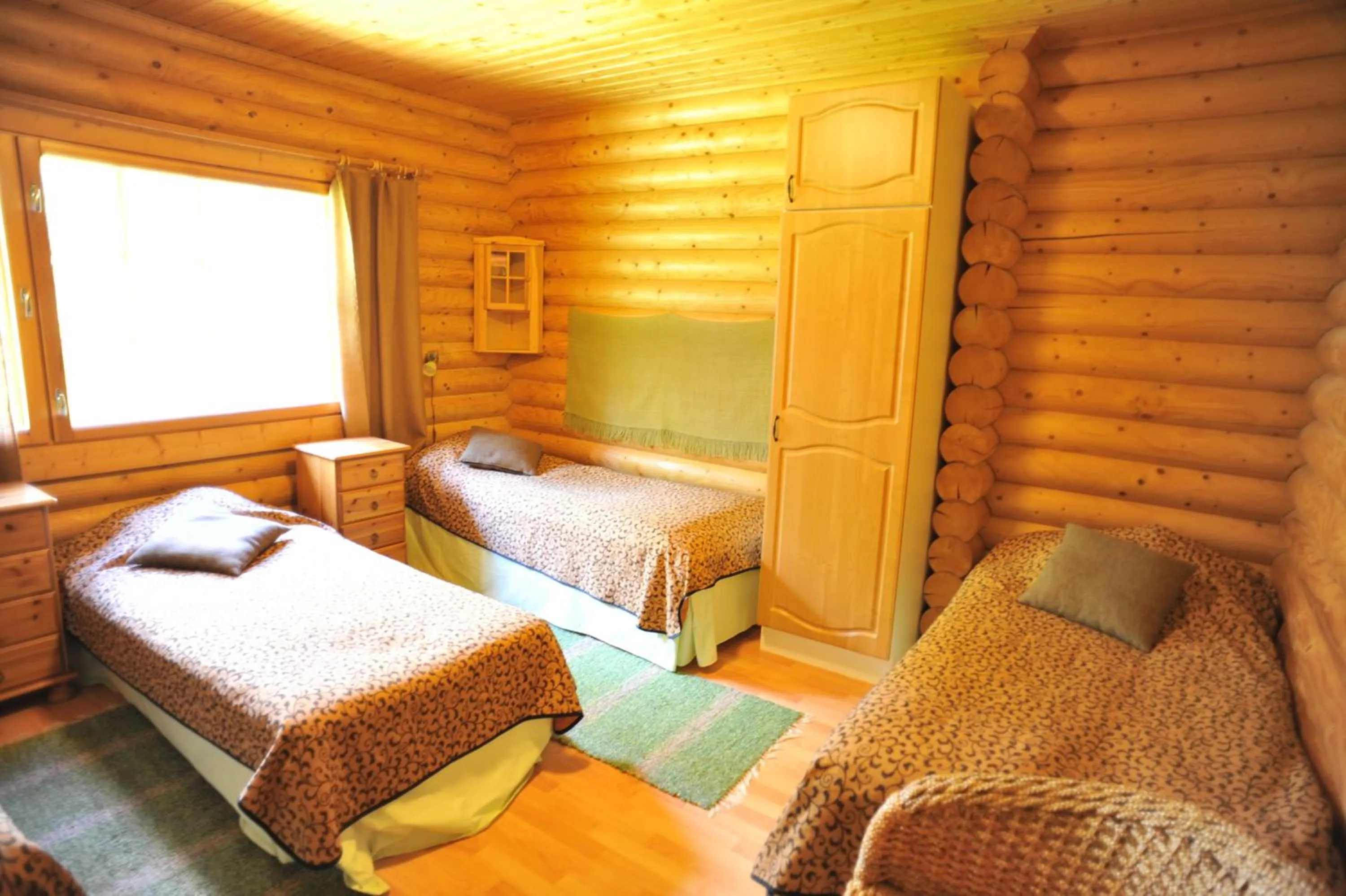 Decorative detail, Bed in Yli-Kaitala Holiday Resort Tuuliviiri