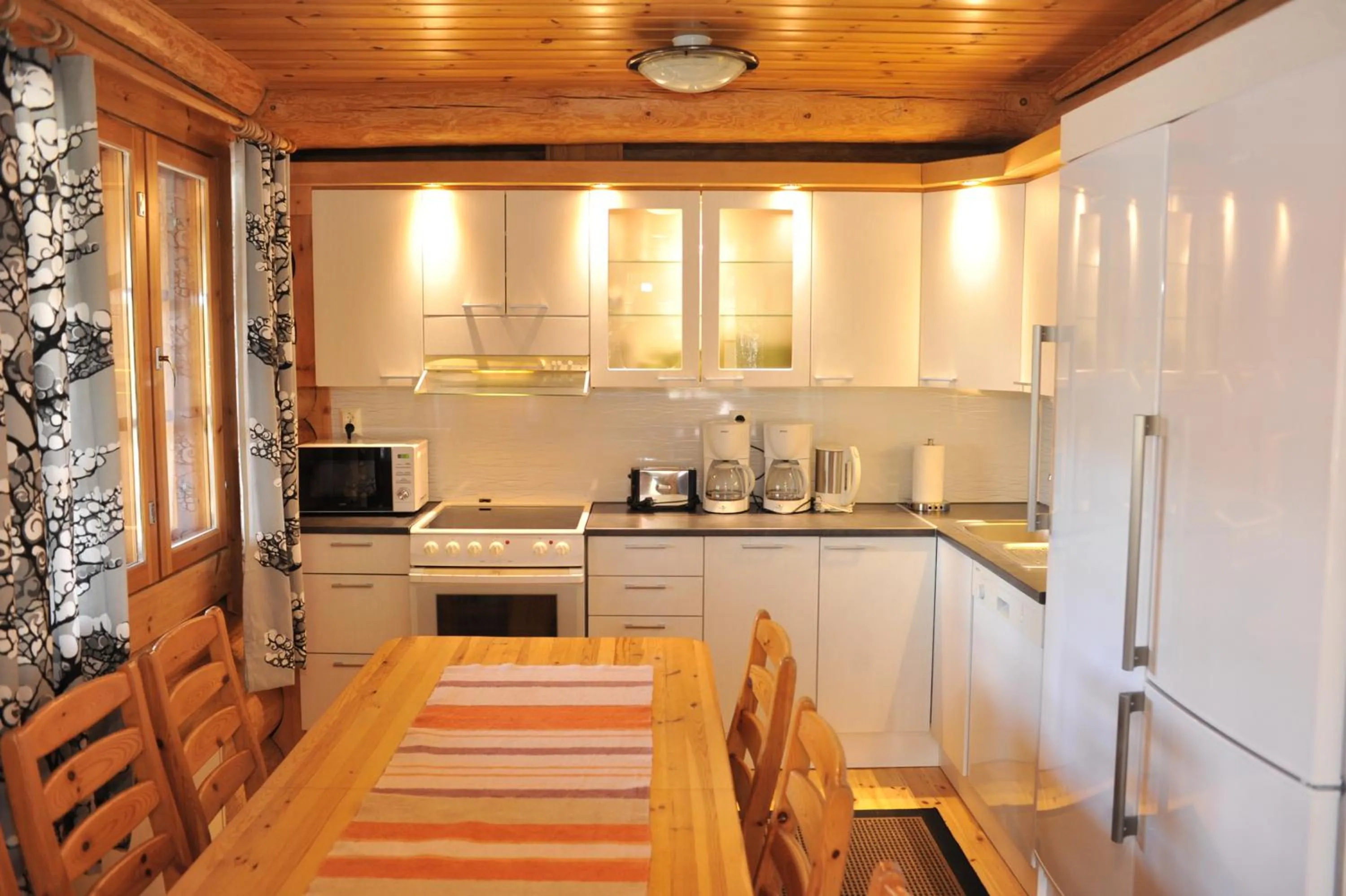 Kitchen or kitchenette in Yli-Kaitala Holiday Resort Tuuliviiri