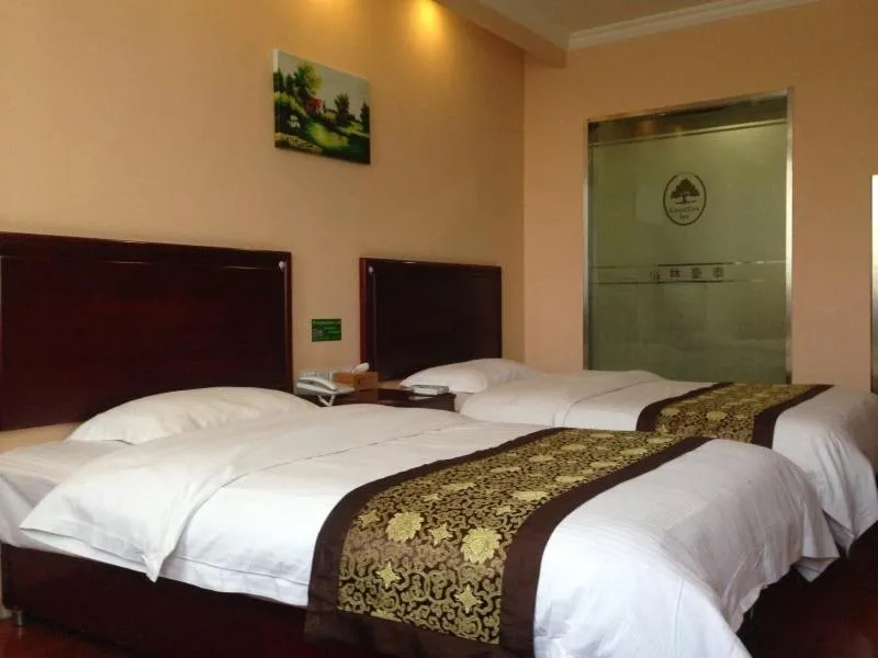 Bed in GreenTree Inn Jiangsu ZhenJiang Jurong New Bus Station Express Hotel