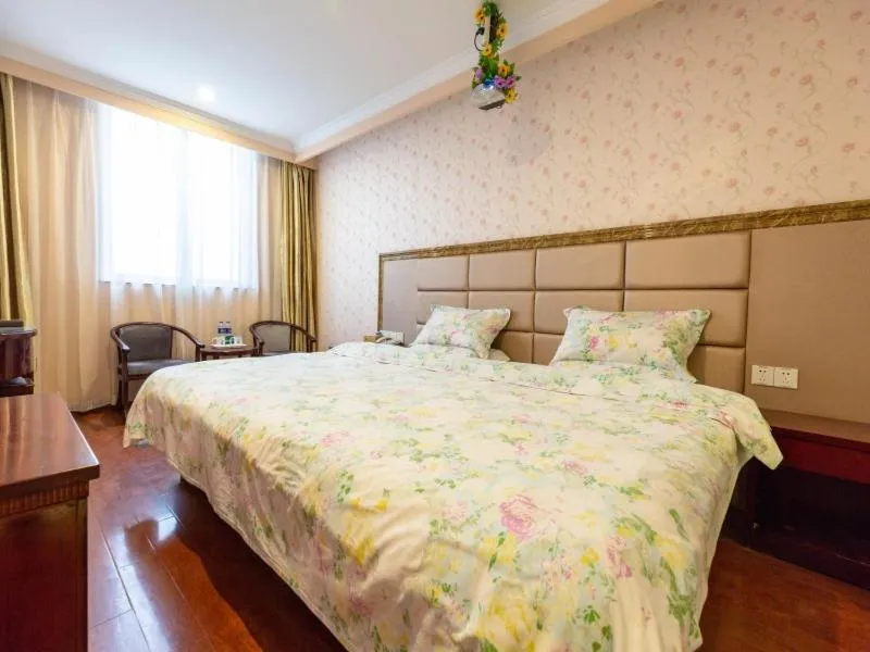 Bed in GreenTree Inn Jiangsu ZhenJiang Jurong New Bus Station Express Hotel