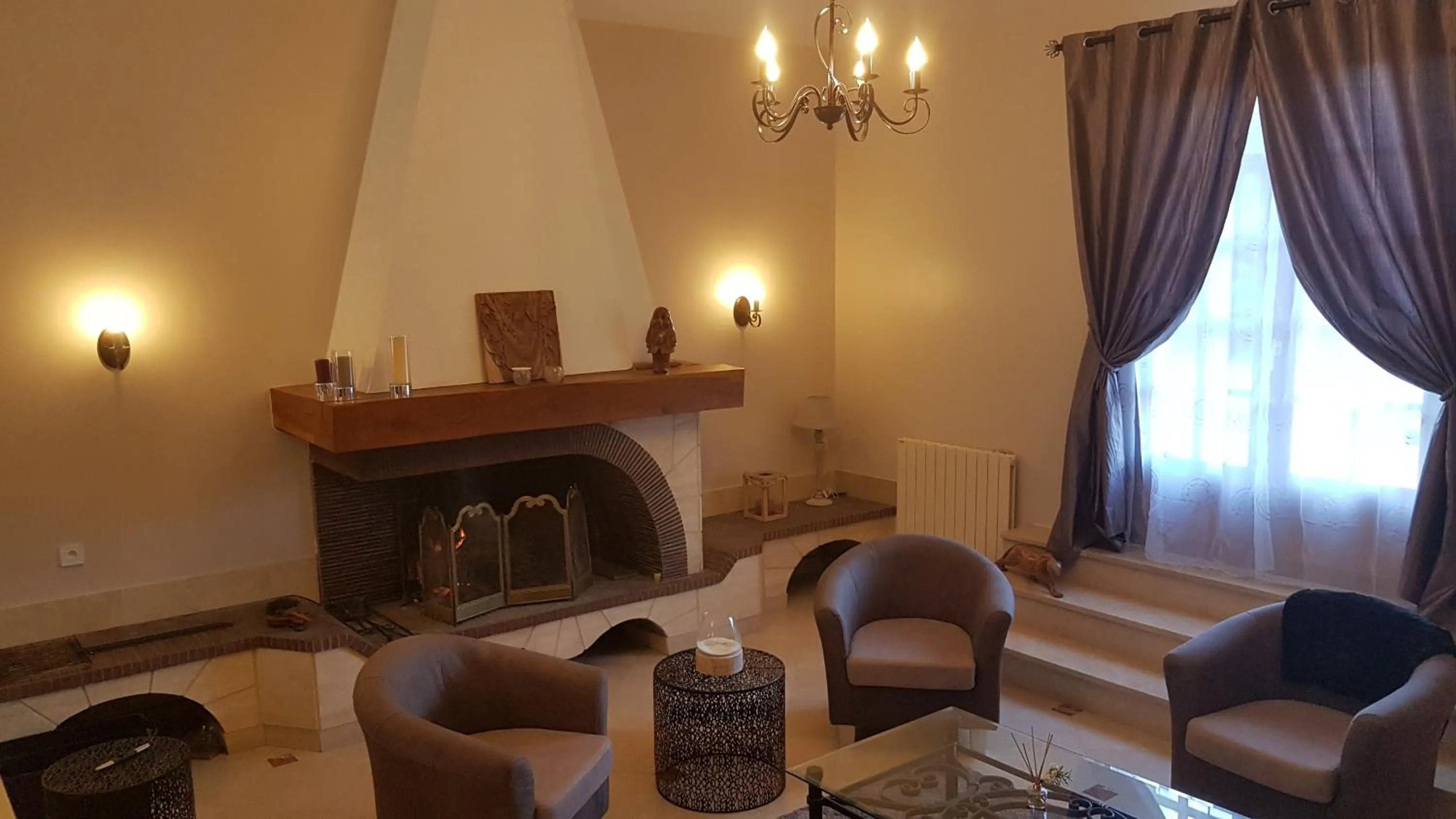 Communal lounge/ TV room in Le Clos Magedon