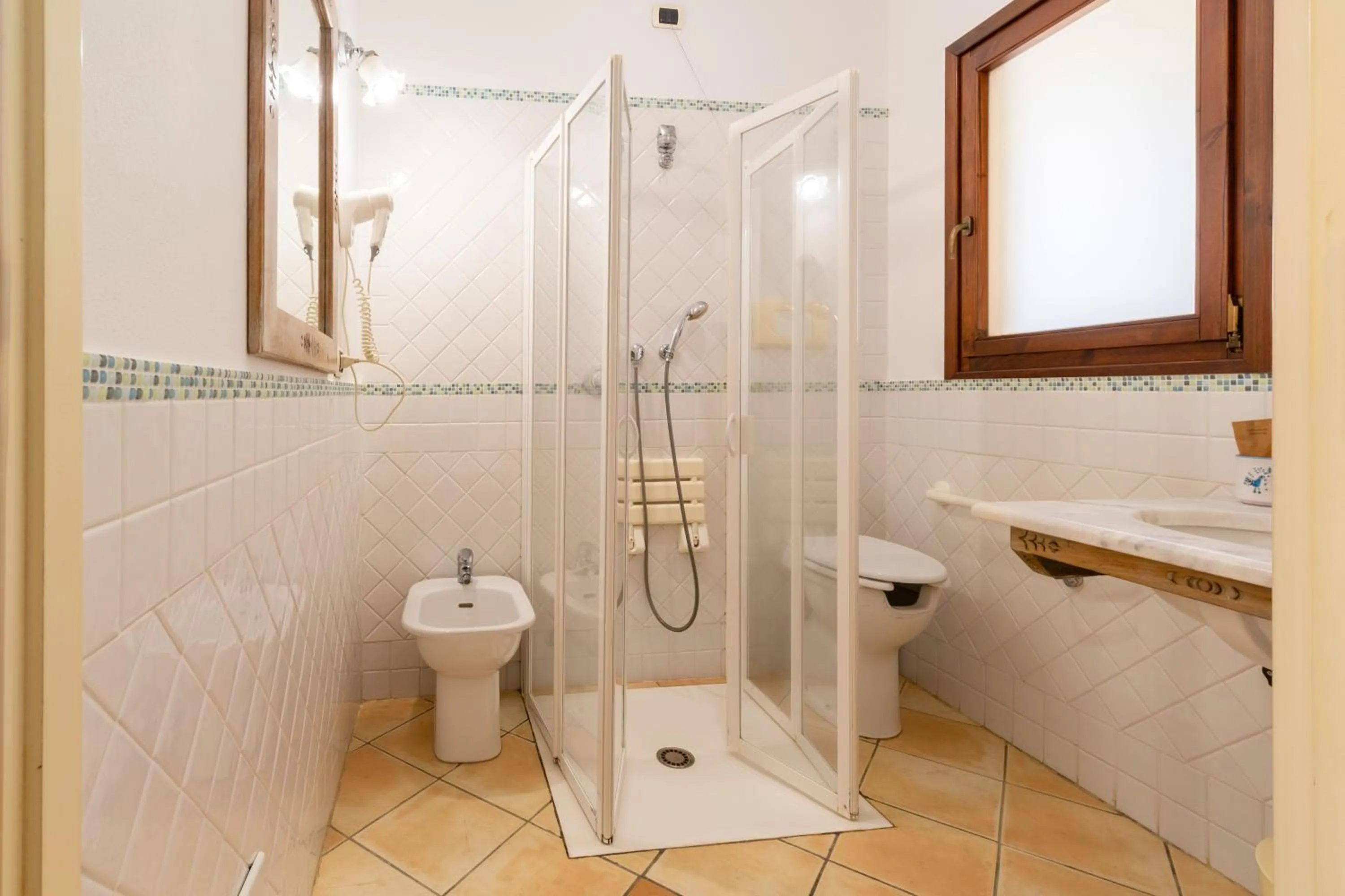 Bathroom in Porto Giunco Residence