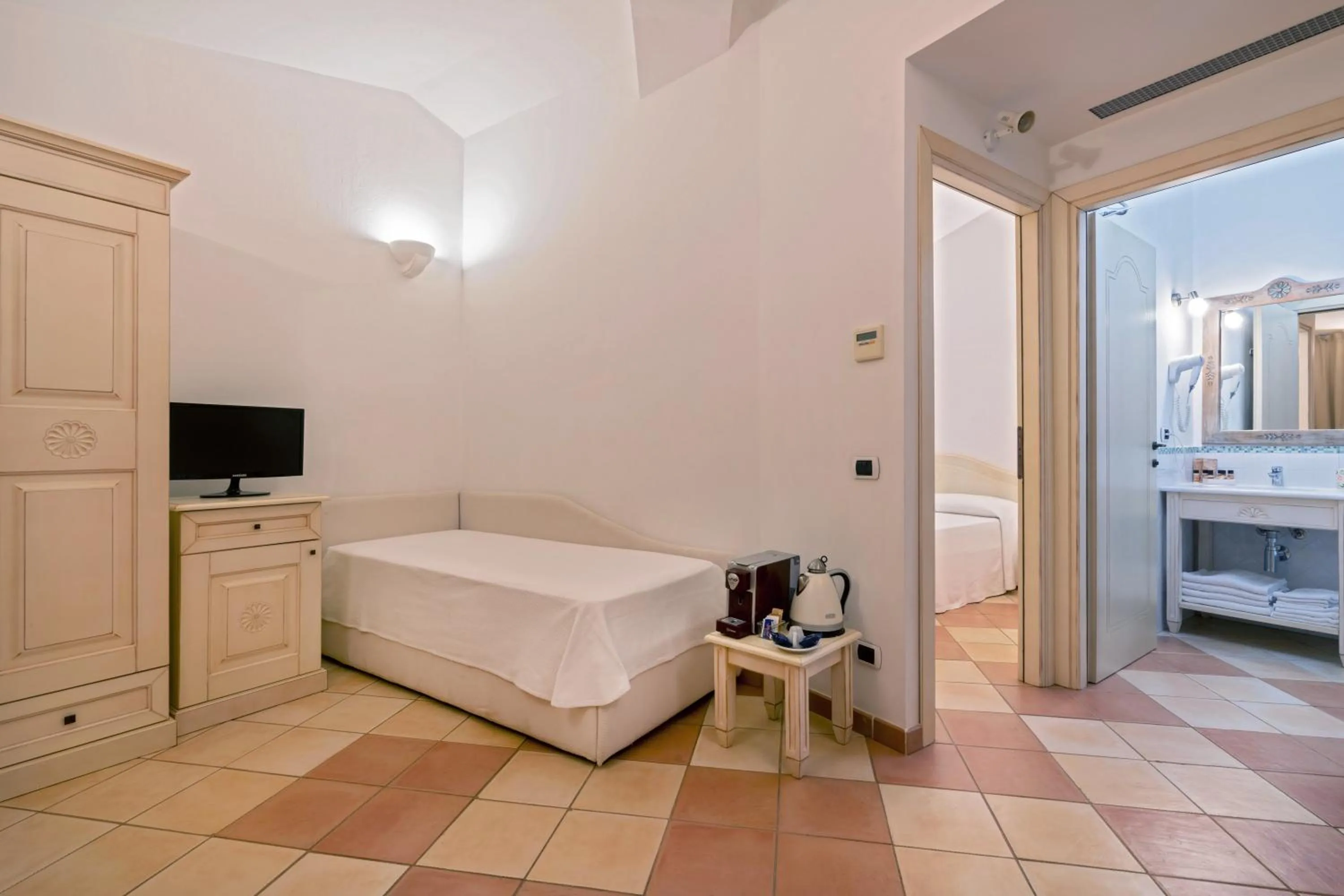 Bed in Porto Giunco Residence