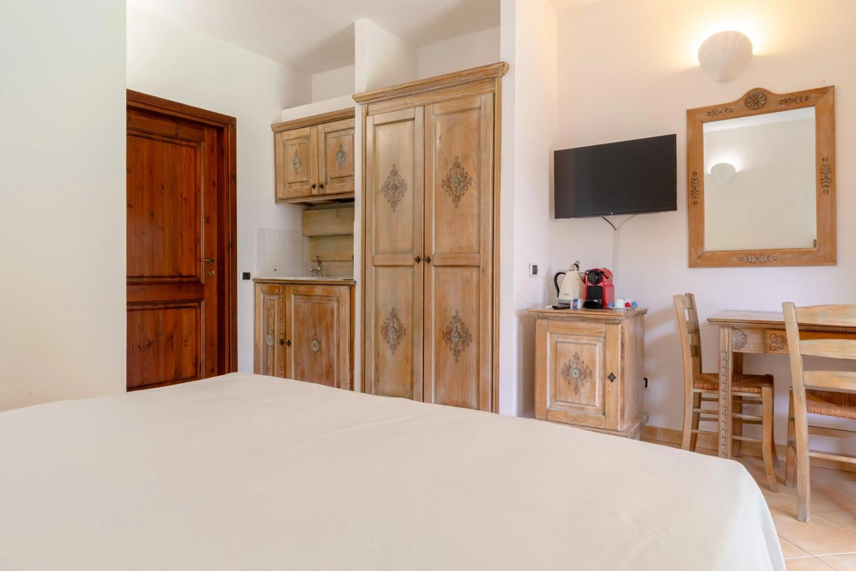 Bedroom in Porto Giunco Residence