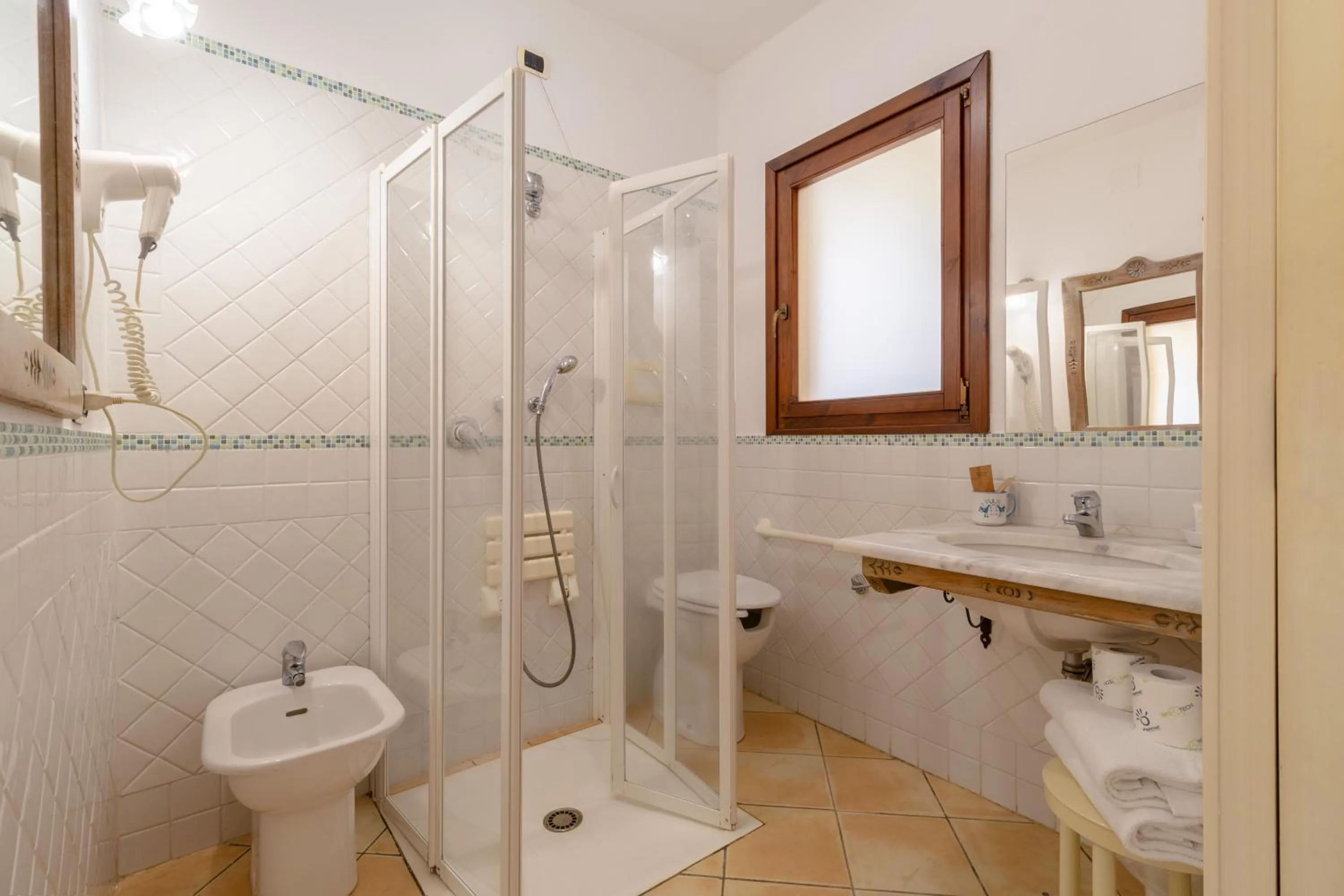 Bathroom in Porto Giunco Residence