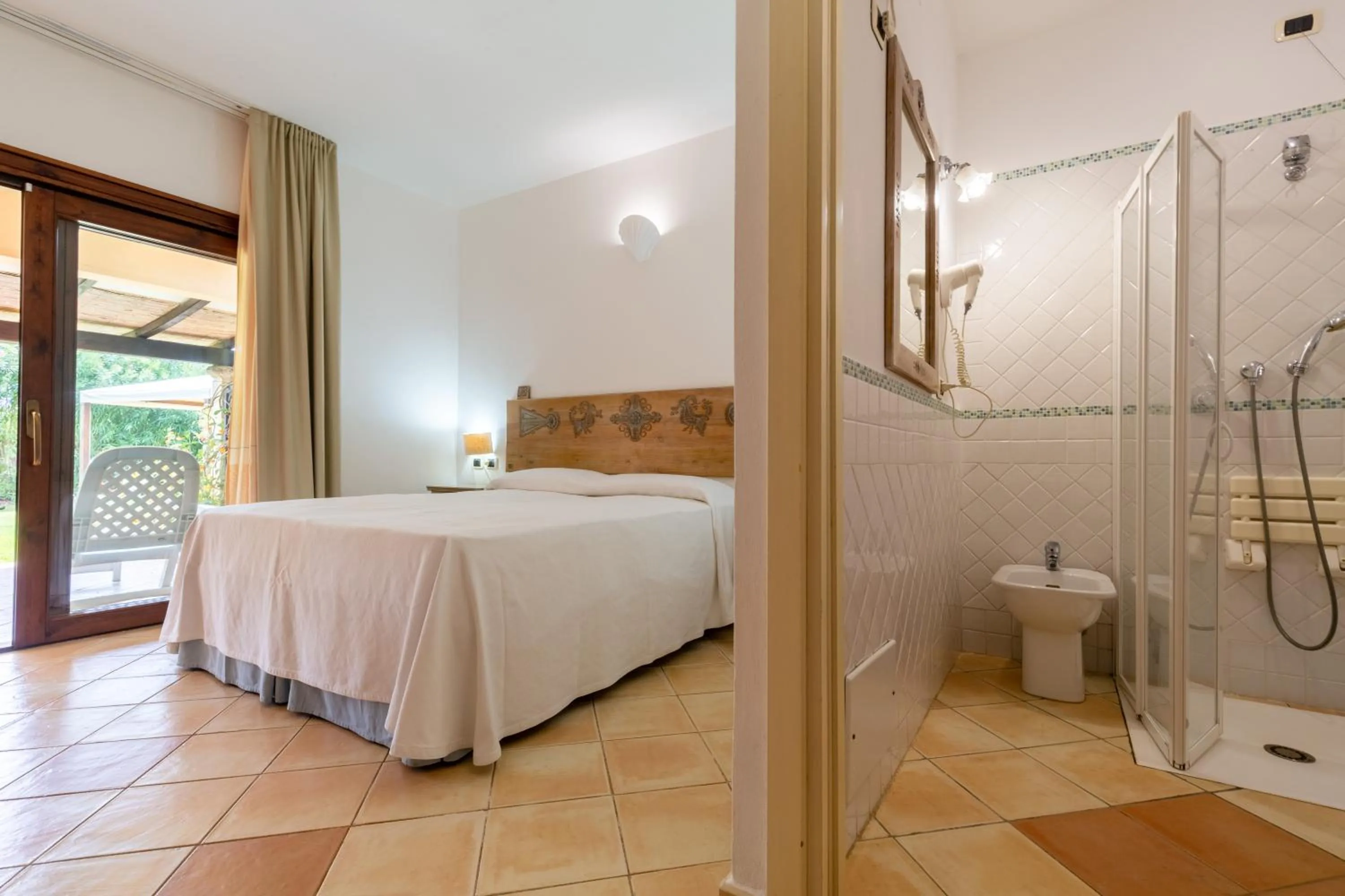 Bedroom in Porto Giunco Residence