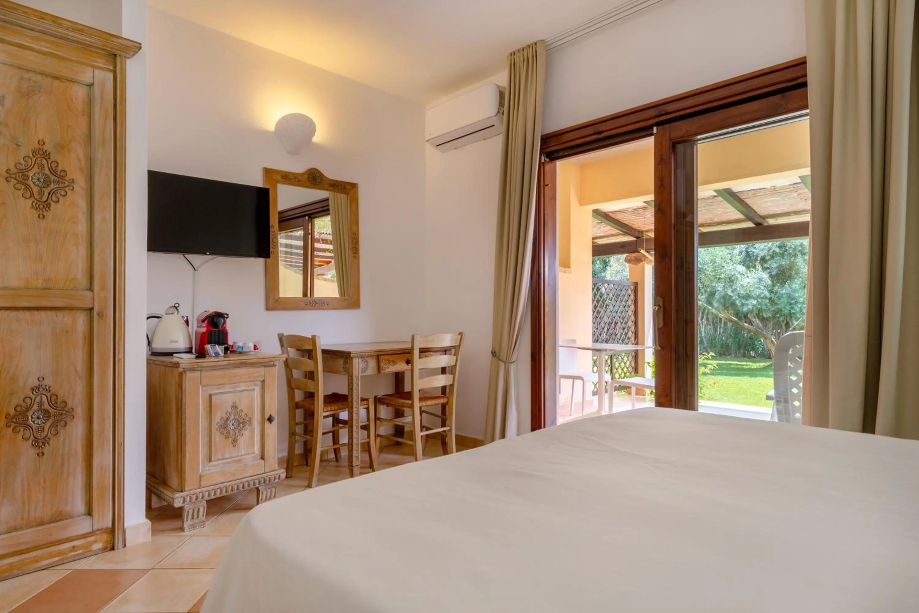 Bedroom in Porto Giunco Residence